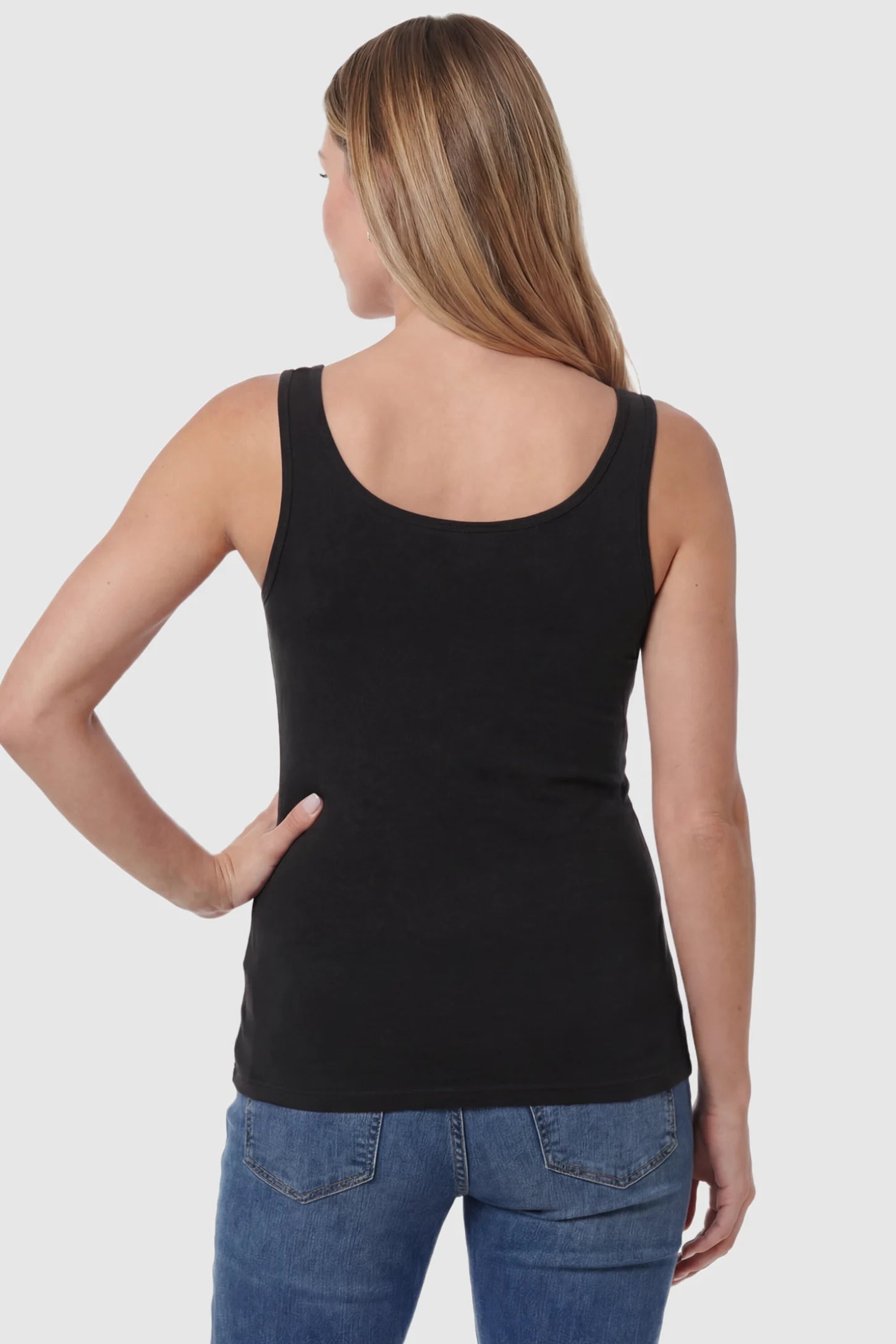 Basic Maternity & Nursing Tank Top in black featuring a scoop neck and smooth, body-hugging fit on a pregnant model, back view.