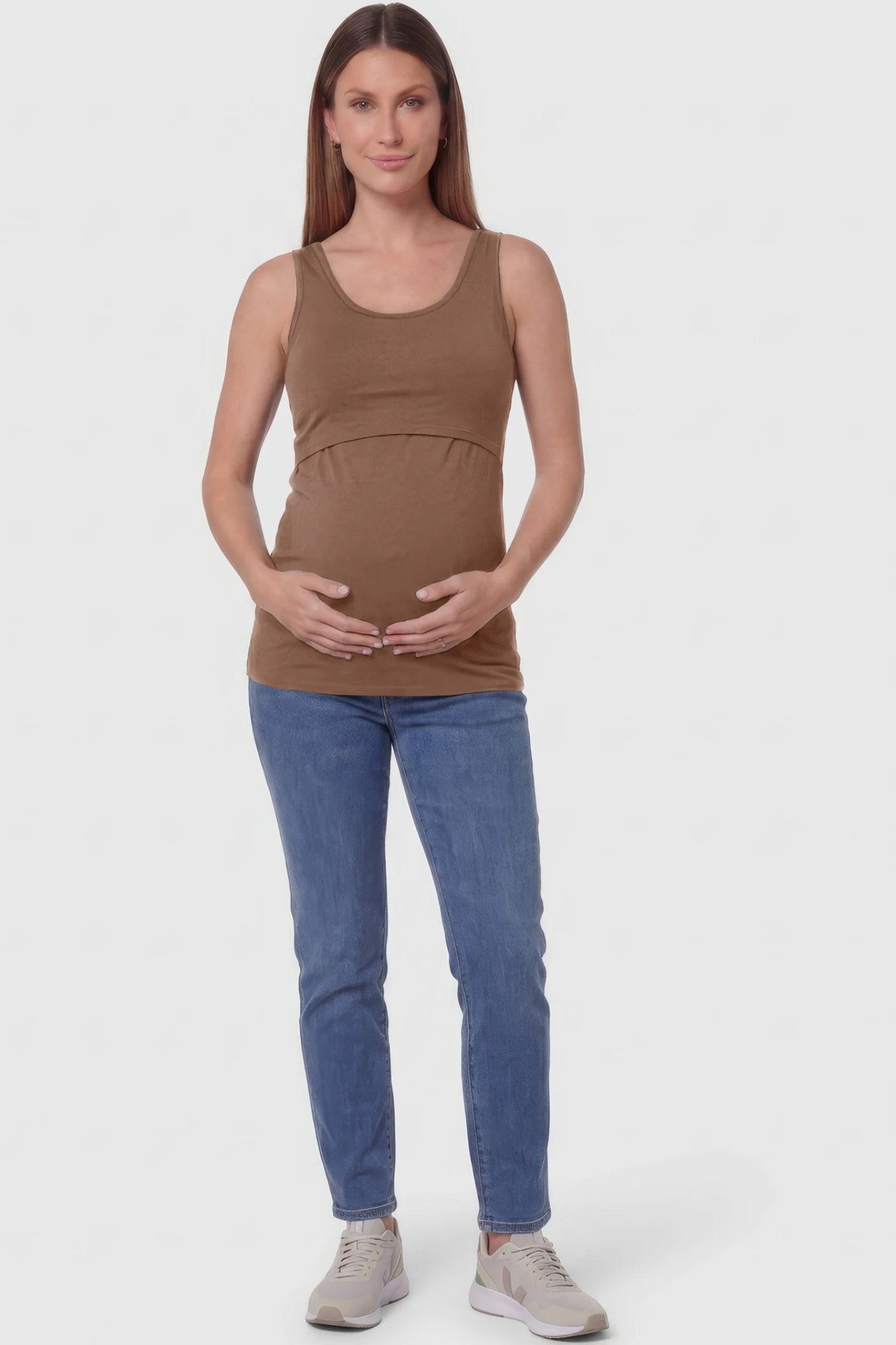 Basic Maternity & Nursing Tank Top Basic Maternity & Nursing Tank Top in coffee featuring a scoop neck and smooth, body-hugging fit on a pregnant model.
