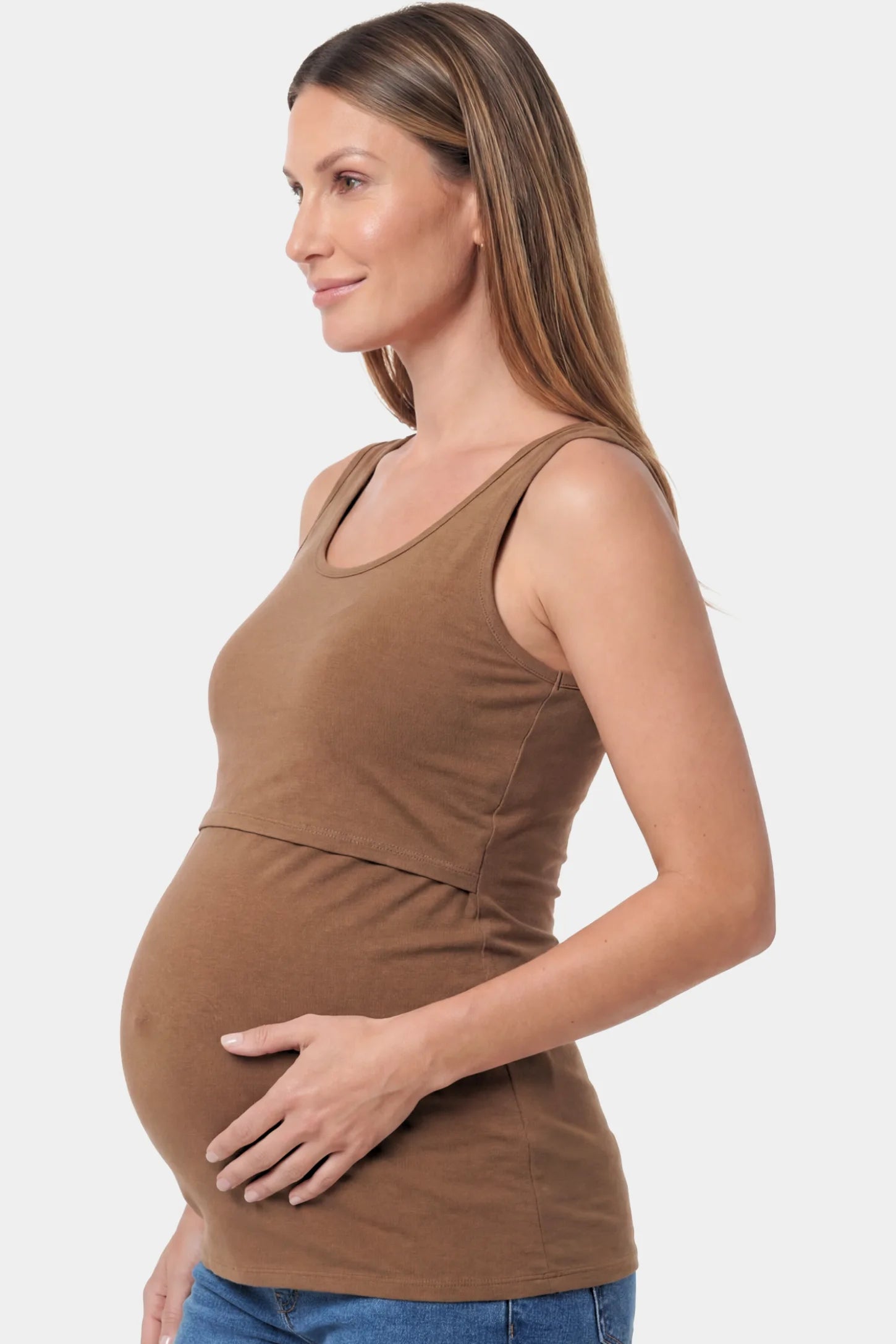 Basic Maternity & Nursing Tank Top Basic Maternity & Nursing Tank Top in coffee featuring a scoop neck and smooth, body-hugging fit on a pregnant model.