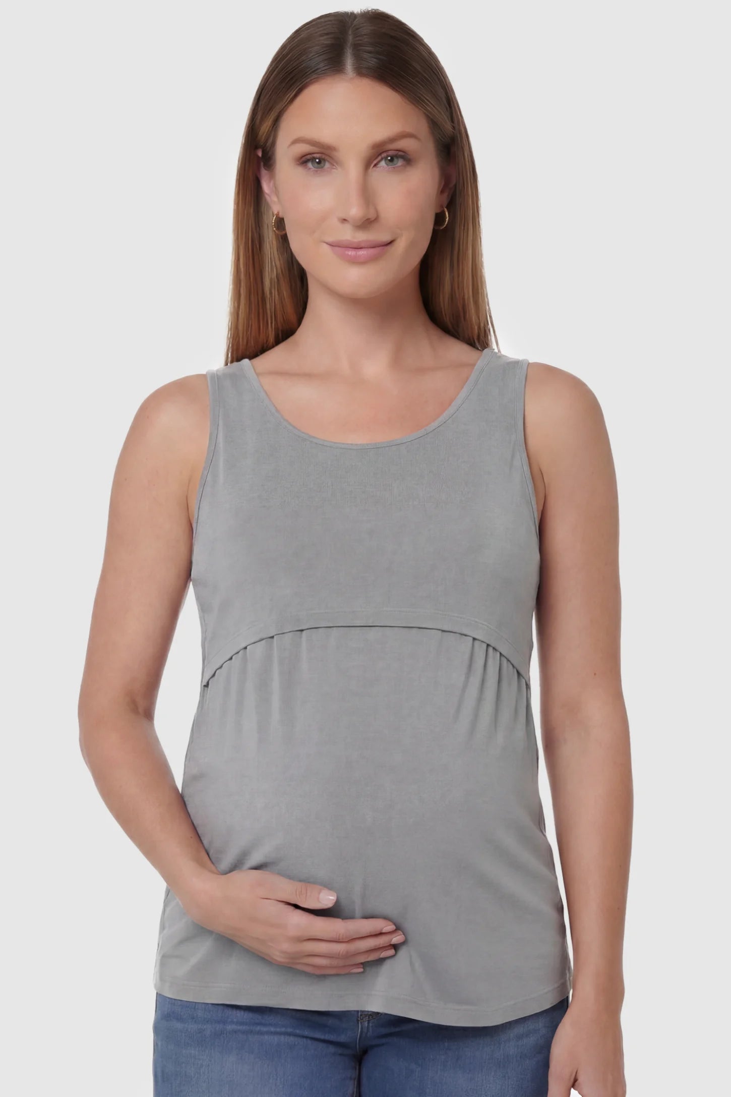 Basic Maternity & Nursing Tank Top Basic Maternity & Nursing Tank Top in gray featuring a scoop neck and smooth, body-hugging fit on a pregnant model, front view.