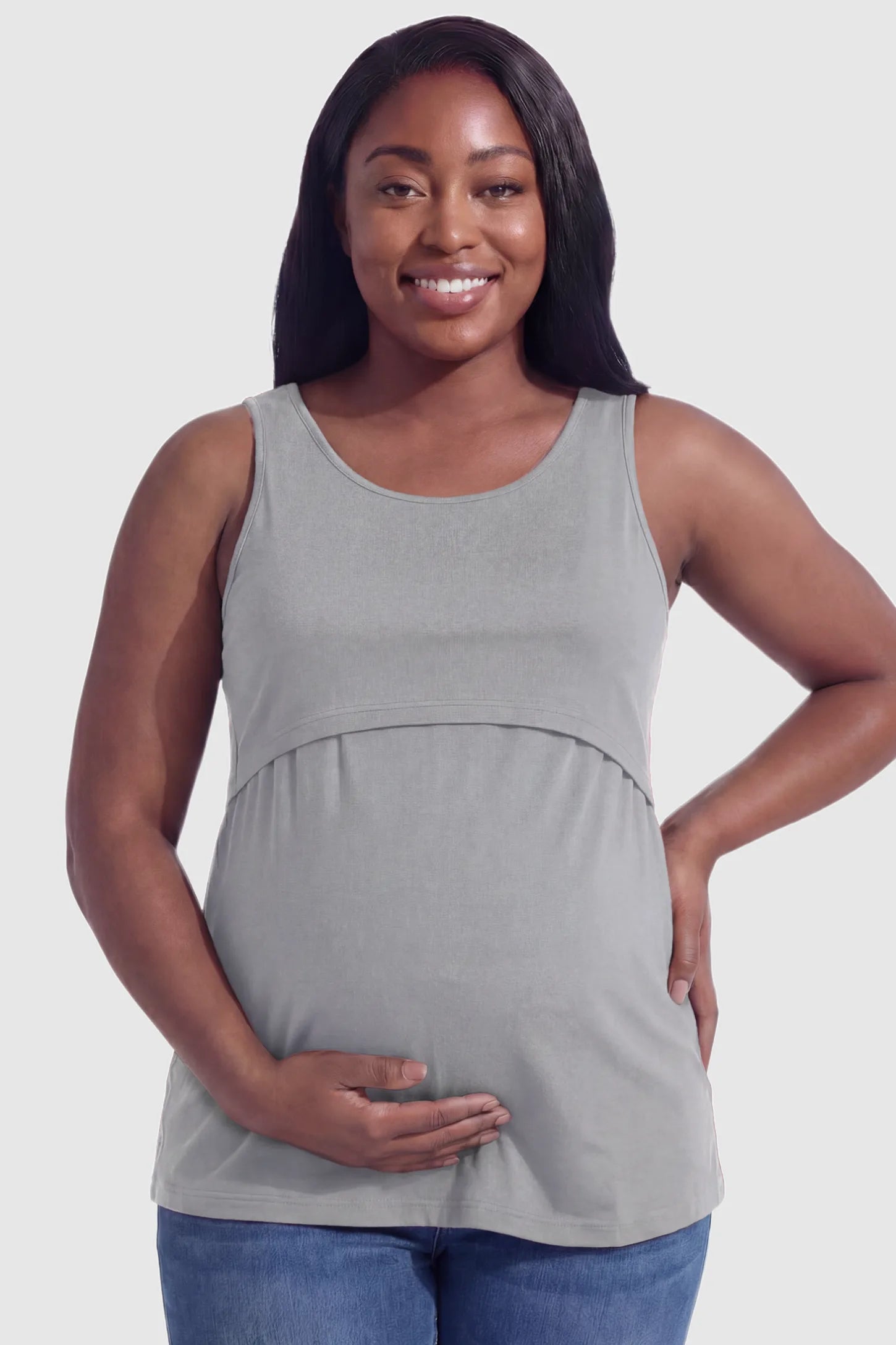 Basic Maternity & Nursing Tank Top Basic Maternity & Nursing Tank Top in gray featuring a scoop neck and smooth, body-hugging fit on a plus size pregnant model, front view.