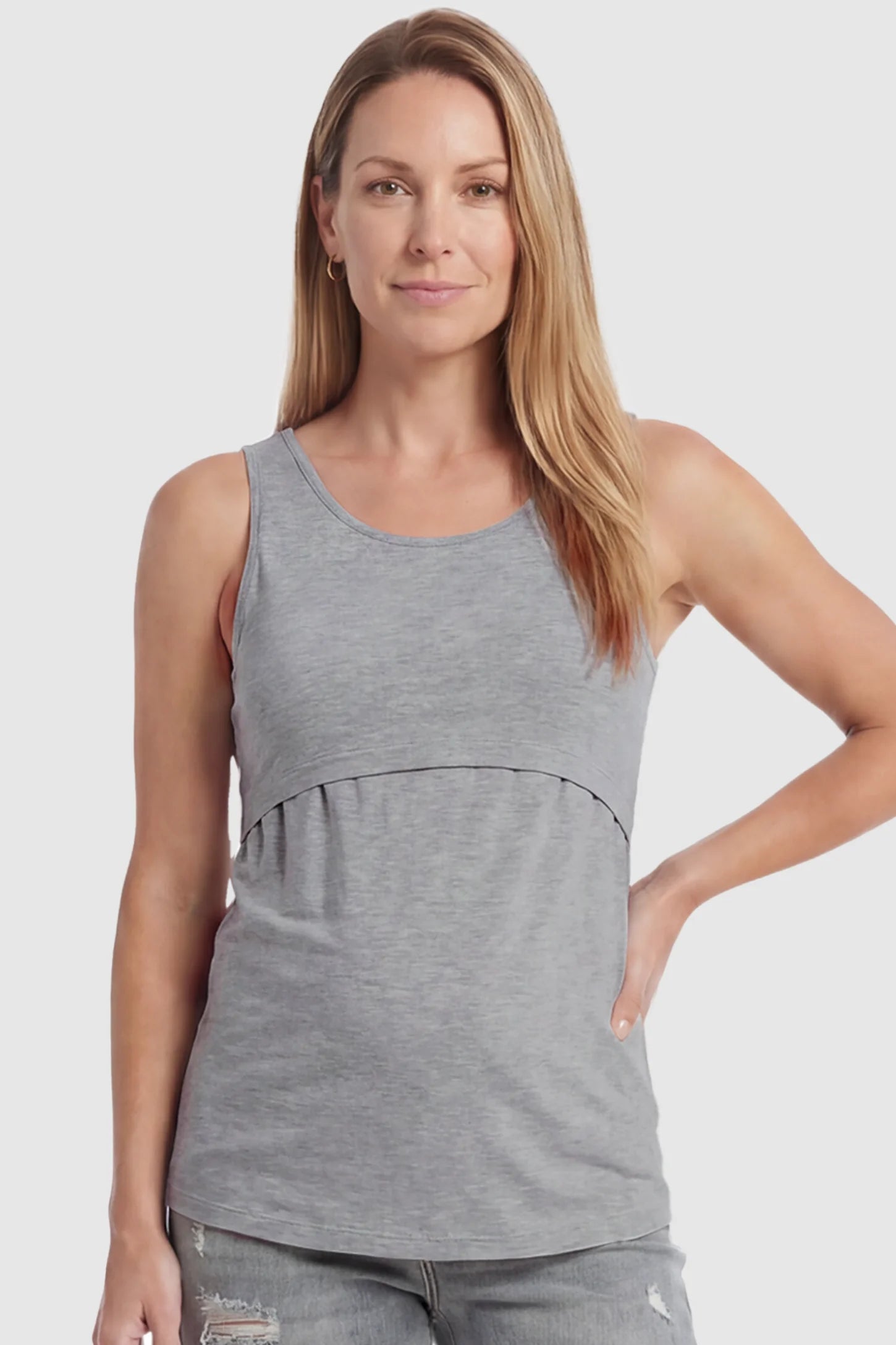Basic Maternity & Nursing Tank Top Basic Maternity & Nursing Tank Top in gray featuring a scoop neck and smooth, body-hugging fit on a postpartum model, front view.
