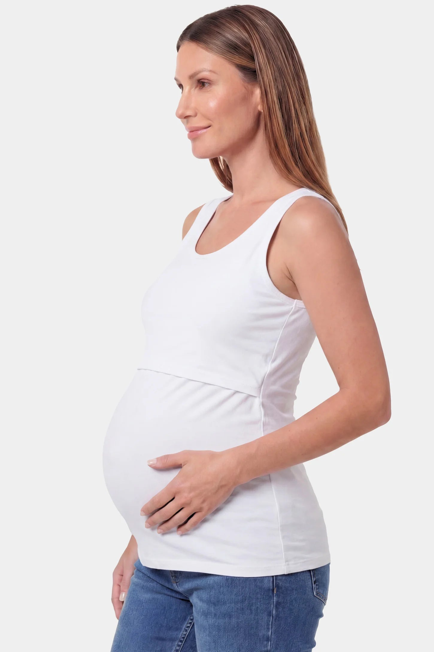 Basic Maternity & Nursing Tank Top in white featuring a scoop neck and smooth, body-hugging fit on a pregnant model.