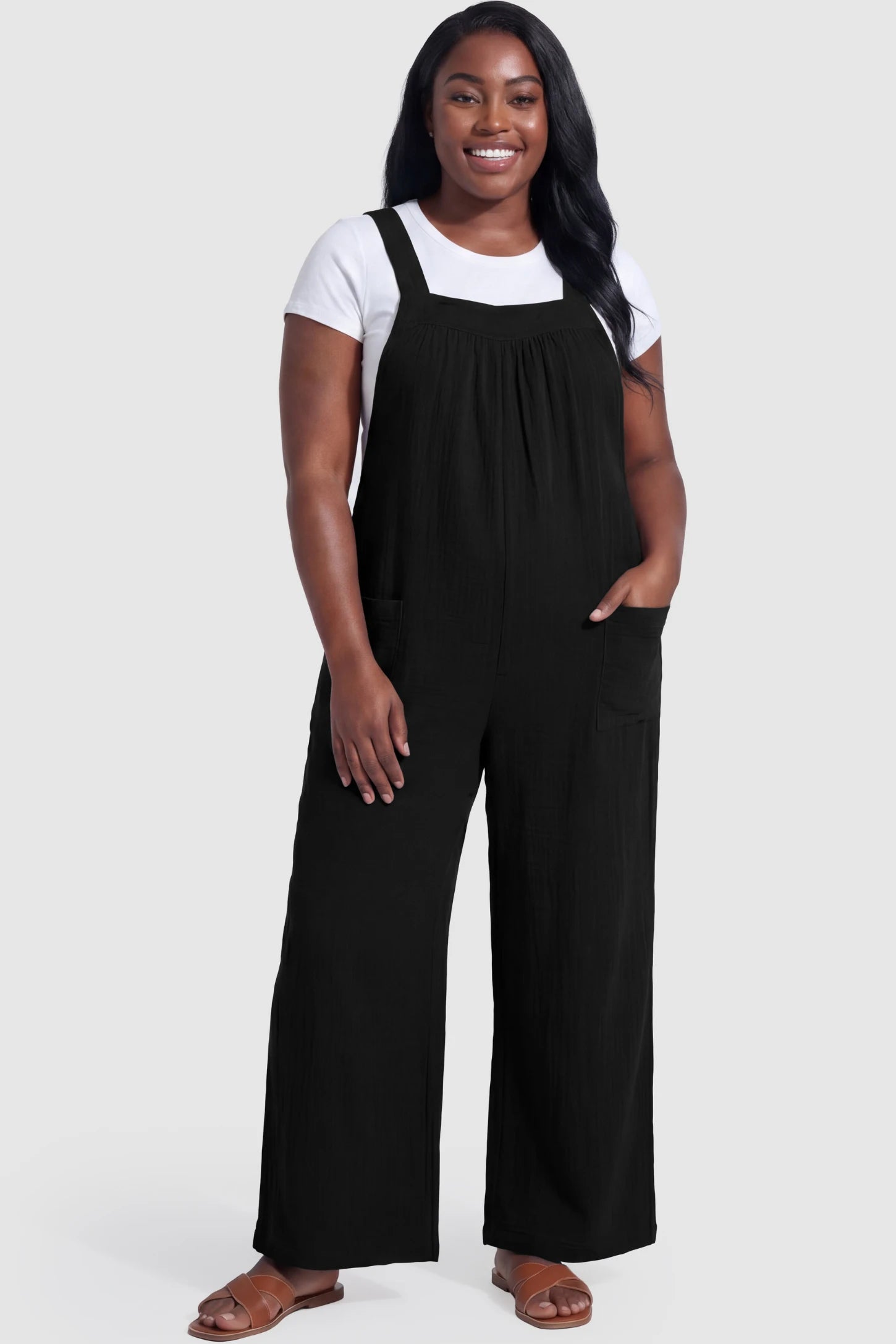 Square Neck Tie-Back Wide Leg Maternity Overalls Square Neck Tie-Back Wide Leg Maternity Overalls in black featuring adjustable tie-back and wide leg silhouette on a pregnant model