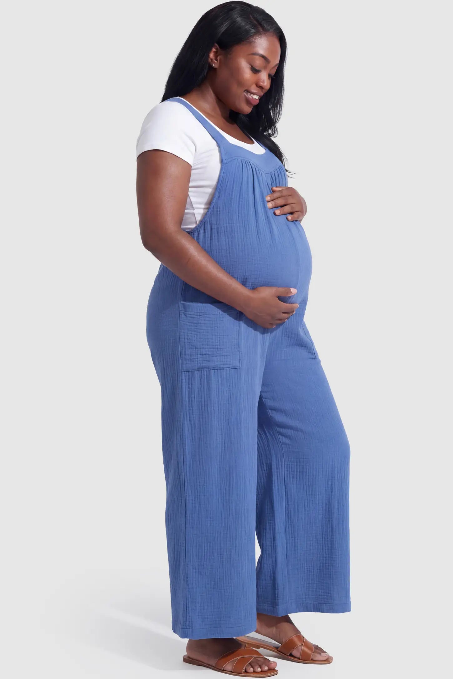 Square Neck Tie-Back Wide Leg Maternity Overalls Square Neck Tie-Back Wide Leg Maternity Overalls in royal blue featuring adjustable tie-back and wide leg silhouette on a pregnant model