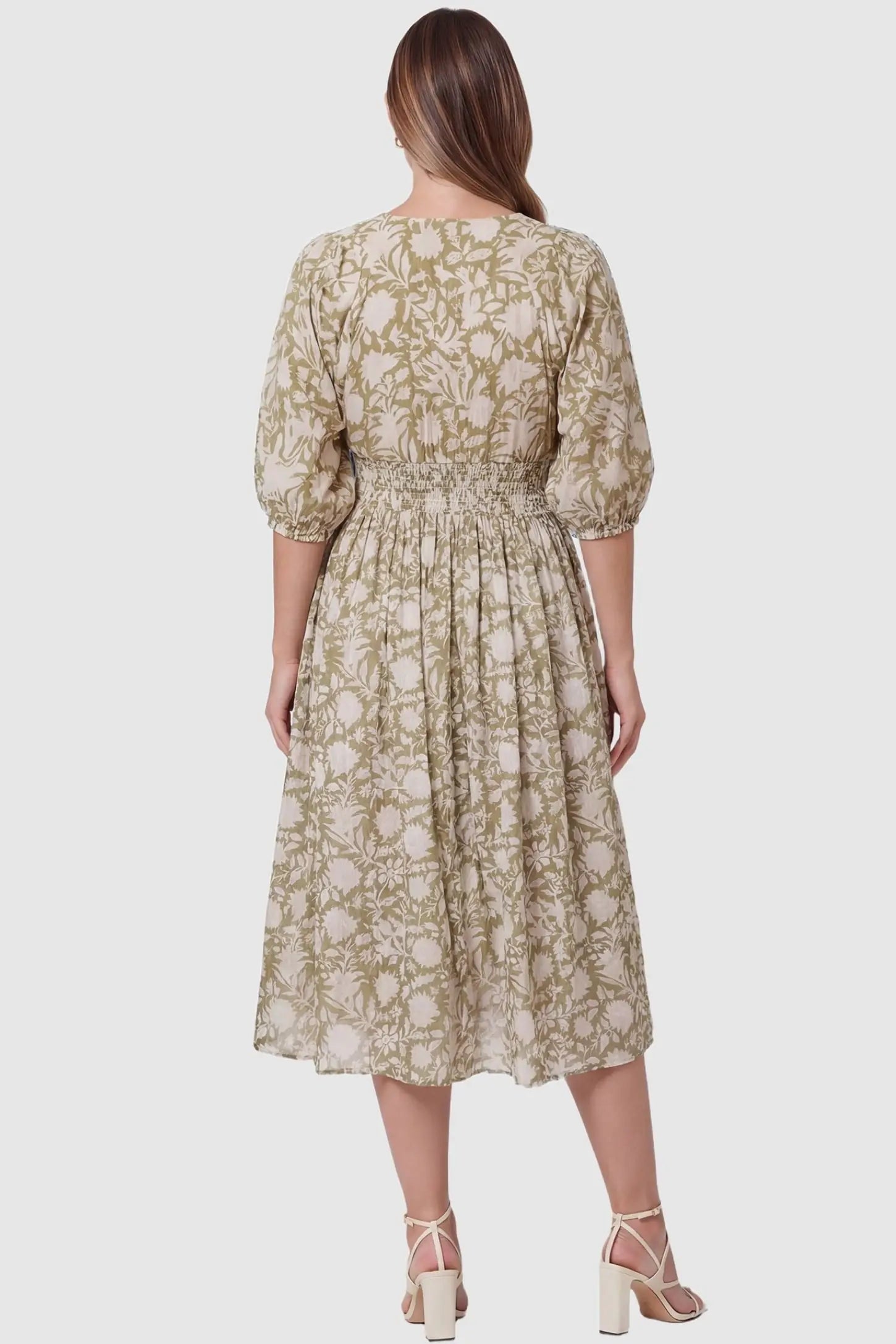 Floral Tie Neck Lantern Sleeve Maternity Midi Dress Floral Tie Neck Lantern Sleeve Maternity Midi Dress in Olive Green featuring a smocked back detail on a pregnant model.