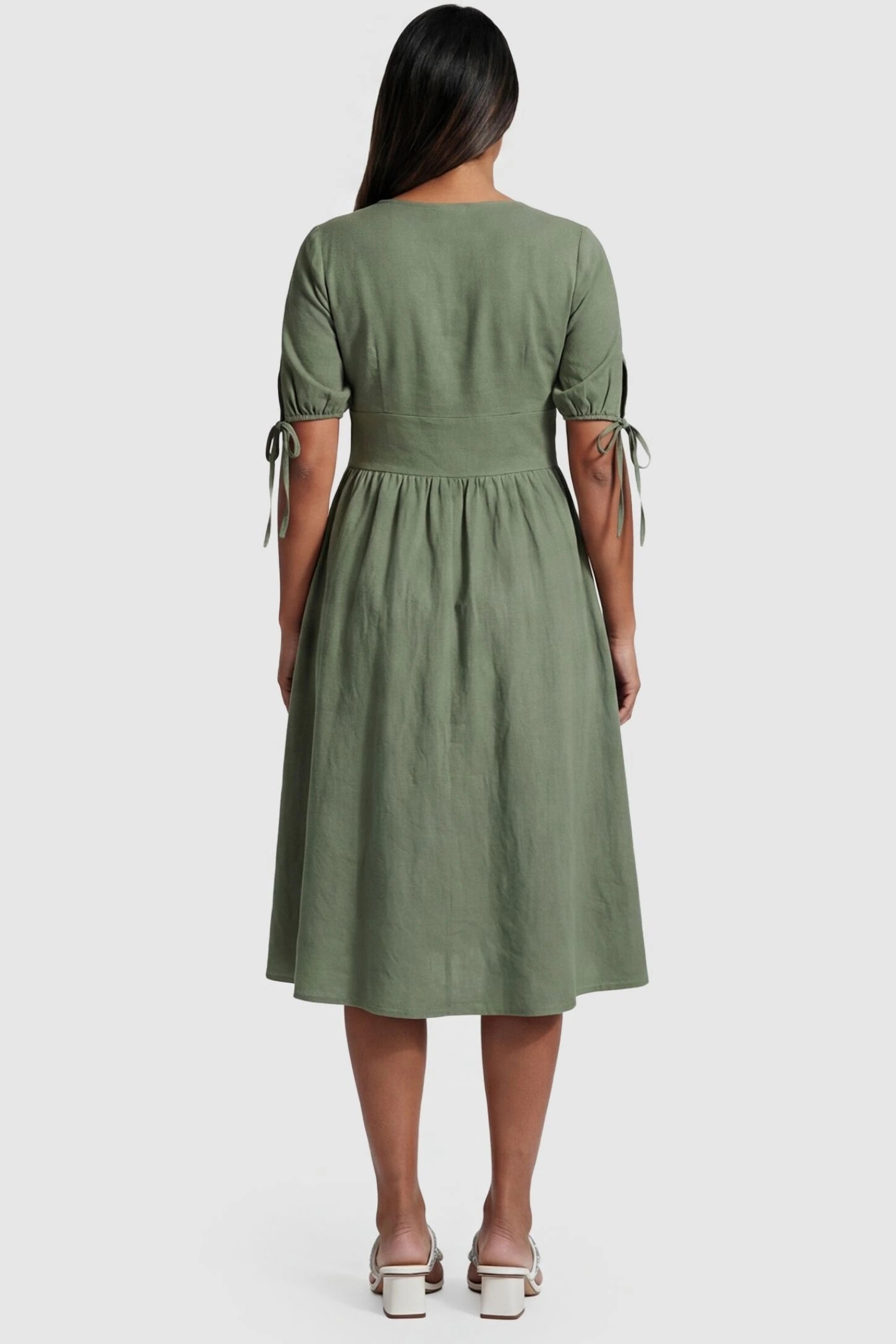 Tie-Sleeve V-Neck Flared Maternity Midi Dress Back view Tie-Sleeve V-Neck Flared Maternity Midi Dress in Green featuring a flared skirt on a non-pregnant model.