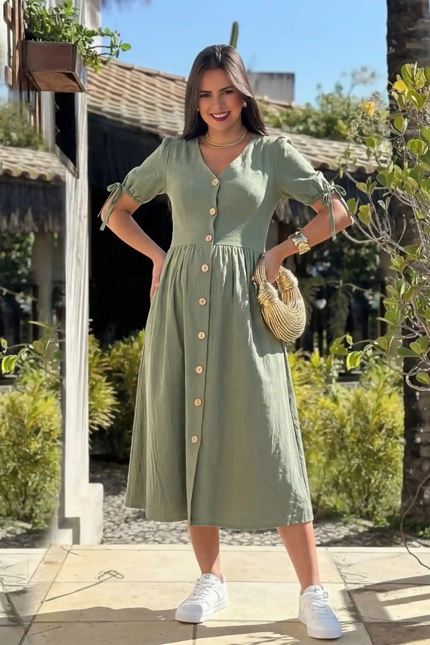 Tie-Sleeve V-Neck Flared Maternity Midi Dress UGC view Tie-Sleeve V-Neck Flared Maternity Midi Dress in Green featuring a v-neckline on a non-pregnant model.