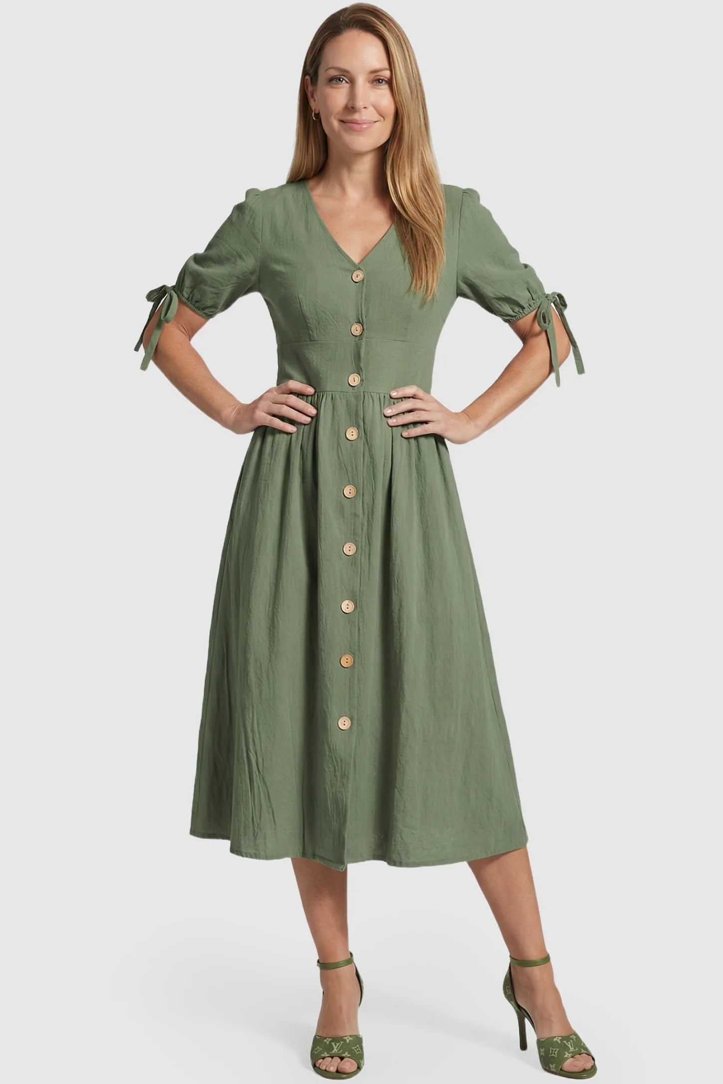 Tie-Sleeve V-Neck Flared Maternity Midi Dress Tie-Sleeve V-Neck Flared Maternity Midi Dress in Green showing the versatile A-line fit on a non-pregnant model.