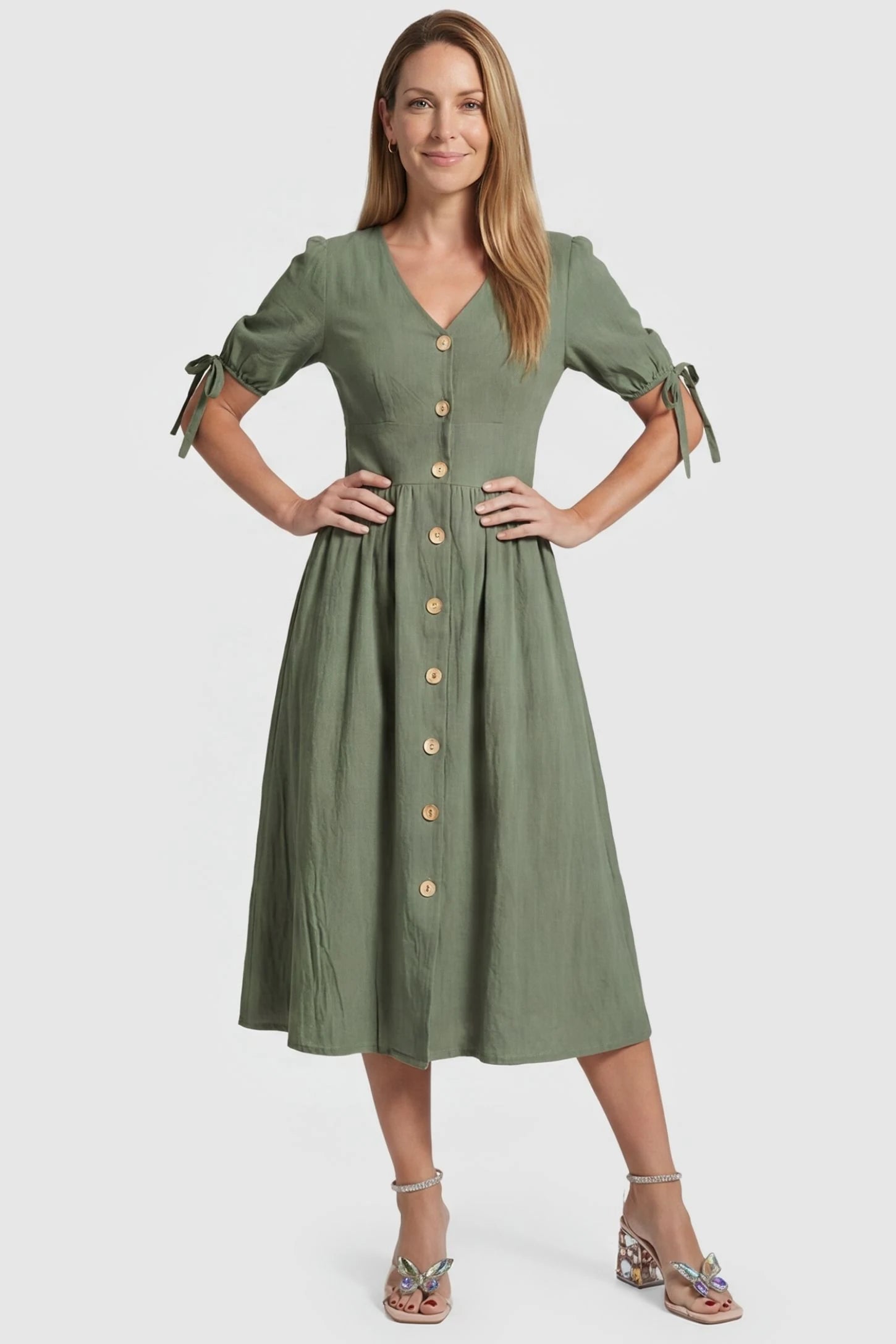 Tie-Sleeve V-Neck Flared Maternity Midi Dress Postpartum view Tie-Sleeve V-Neck Flared Maternity Midi Dress in Green featuring a button front on a non-pregnant model.