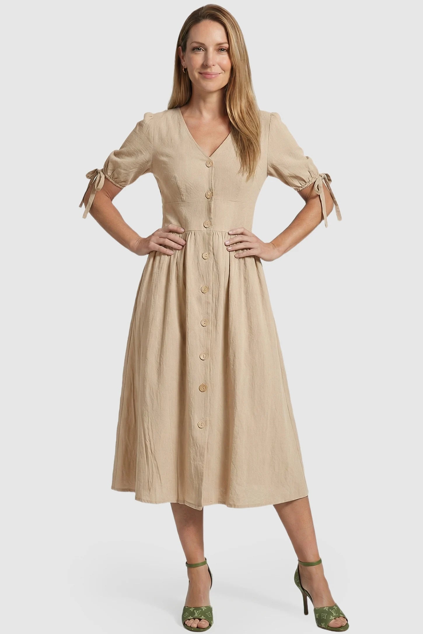 Tie-Sleeve V-Neck Flared Maternity Midi Dress Tie-Sleeve V-Neck Flared Maternity Midi Dress in Apricot featuring a v-neckline on a non-pregnant model