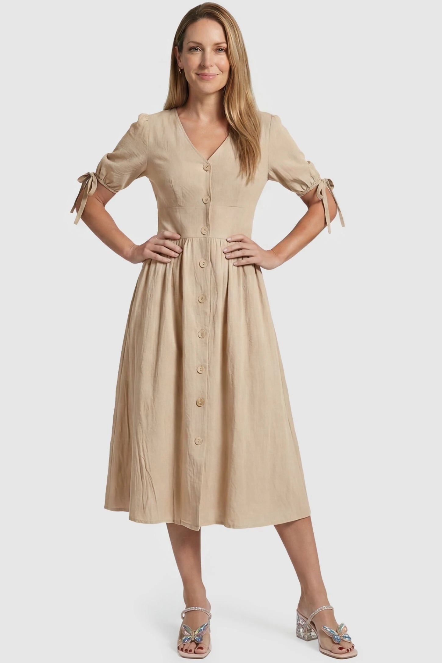 Tie-Sleeve V-Neck Flared Maternity Midi Dress Postpartum view Tie-Sleeve V-Neck Flared Maternity Midi Dress in Apricot featuring a button front on a non-pregnant model.