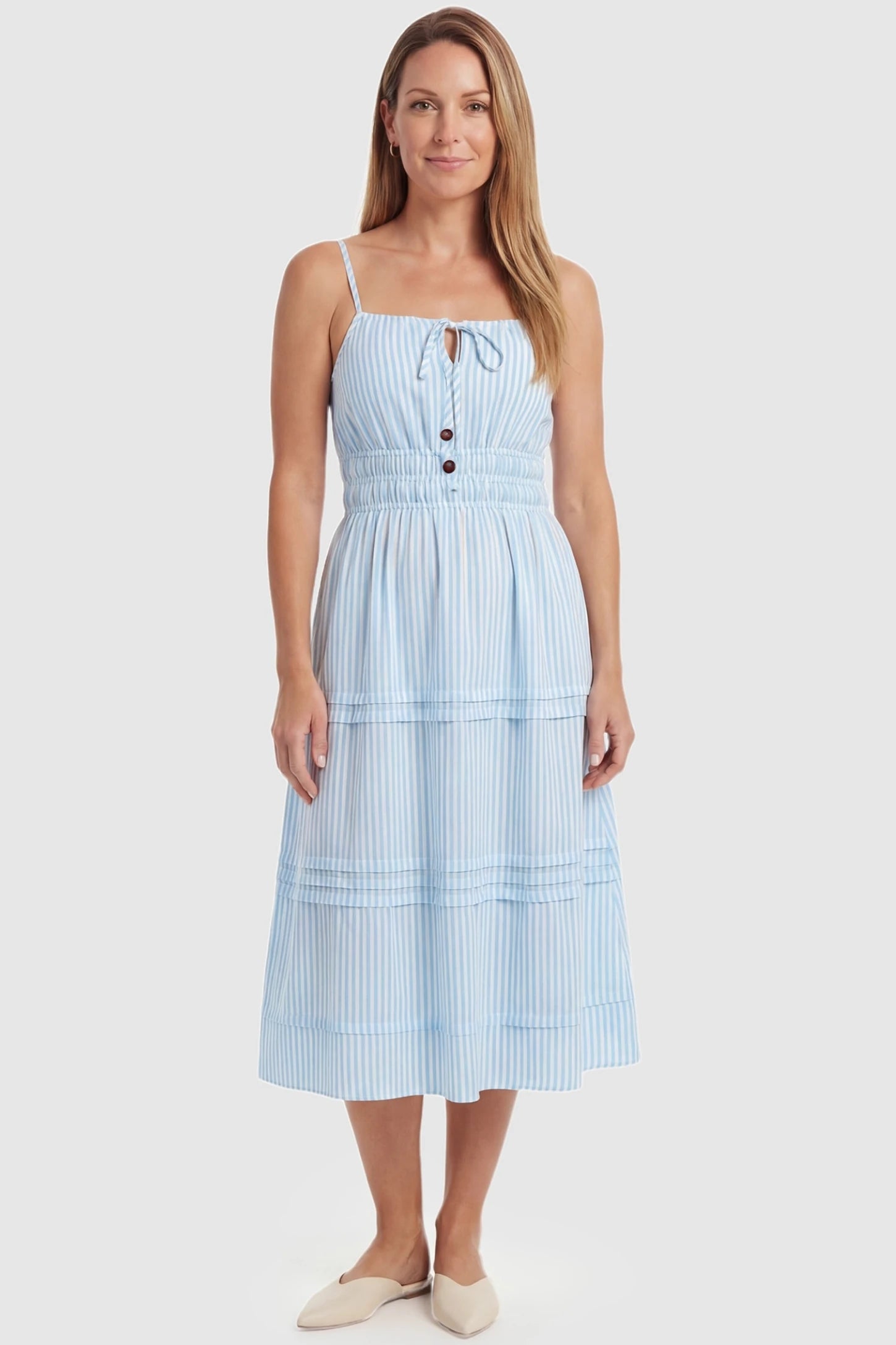 Striped Tie-Front Tiered Maternity Midi Dress Striped Tie-Front Maternity Midi Dress in Blue Striped featuring a square neck on a front-facing non-pregnant model.