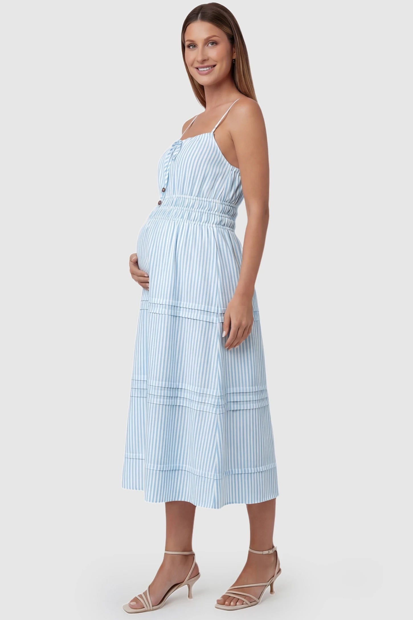 Striped Tie-Front Maternity Midi Dress in Blue Striped featuring a high-waisted silhouette on a side-profile pregnant model.