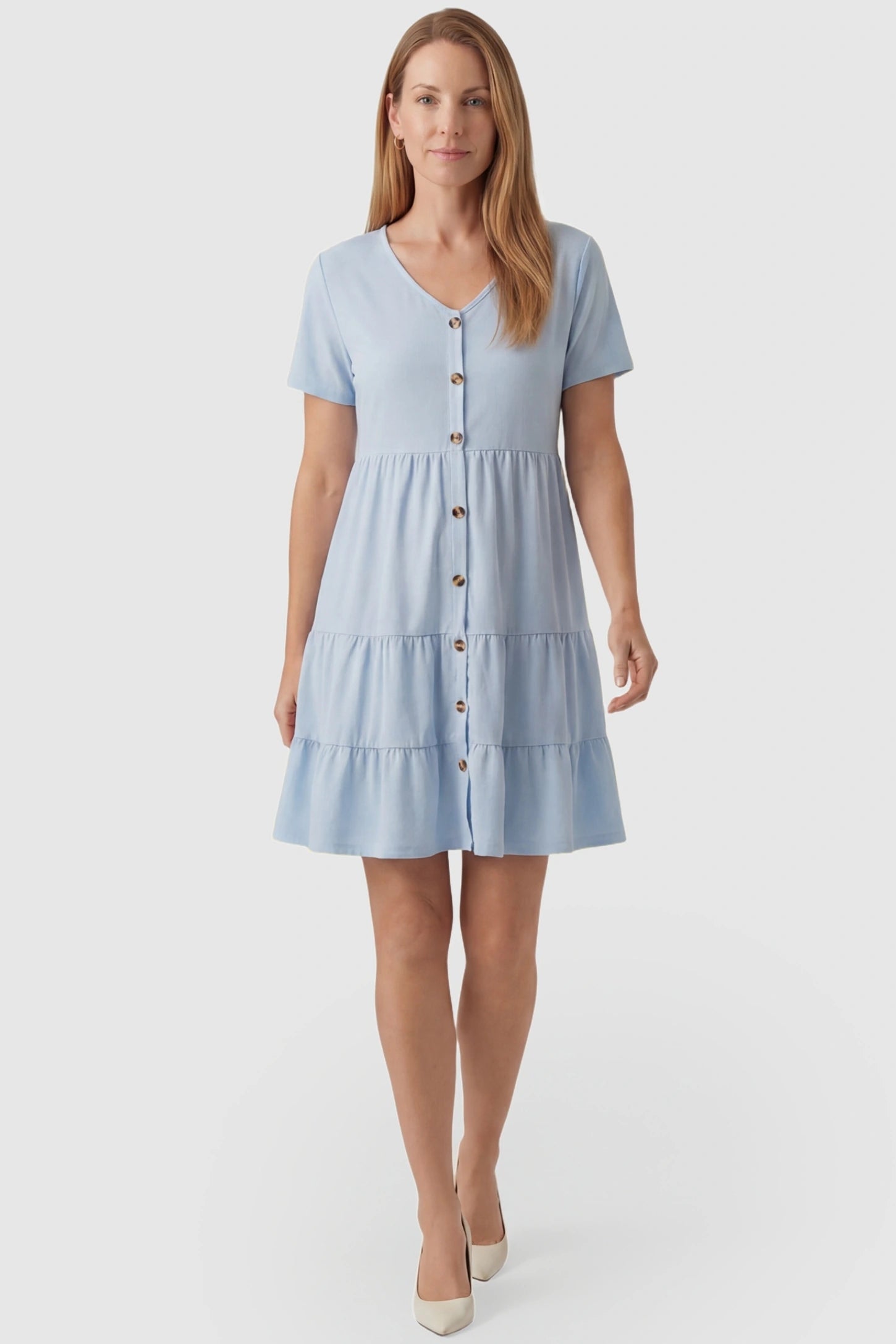 Tiered Button-Front A-Line Maternity Summer Dress Tiered Button-Front A-Line Maternity Summer Dress in Light Blue featuring a versatile silhouette on a non-pregnant model.