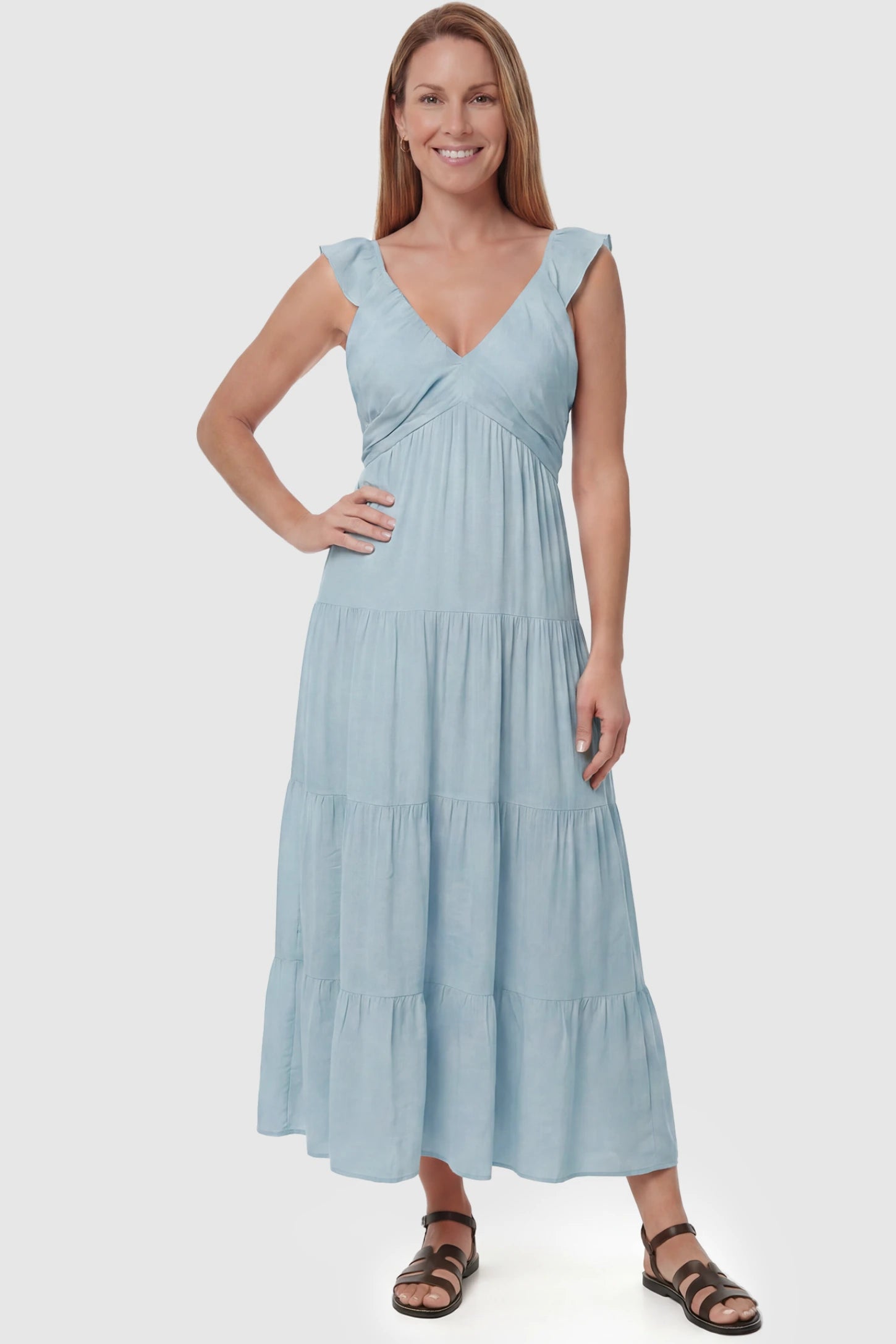 Ruffled Sleeve V-neck A-line Maternity Midi Dress Ruffled sleeve V-neck A-line maternity midi dress in blue with V-neckline and ruffled sleeves, front view on postpartum model