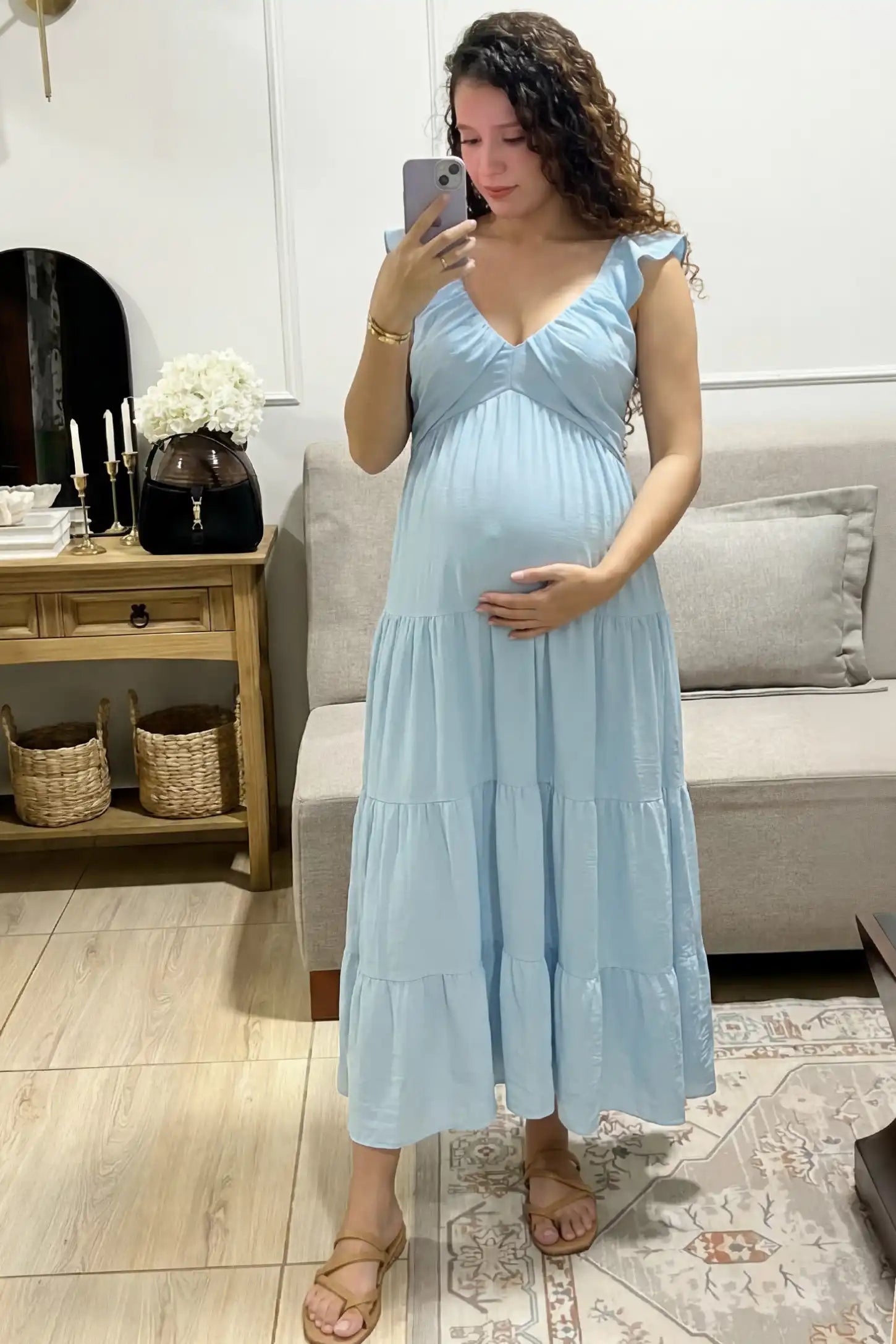 Ruffled Sleeve V-neck A-line Maternity Midi Dress Ruffled sleeve V-neck A-line maternity midi dress in blue with V-neckline and ruffled sleeves, front view on pregnant model