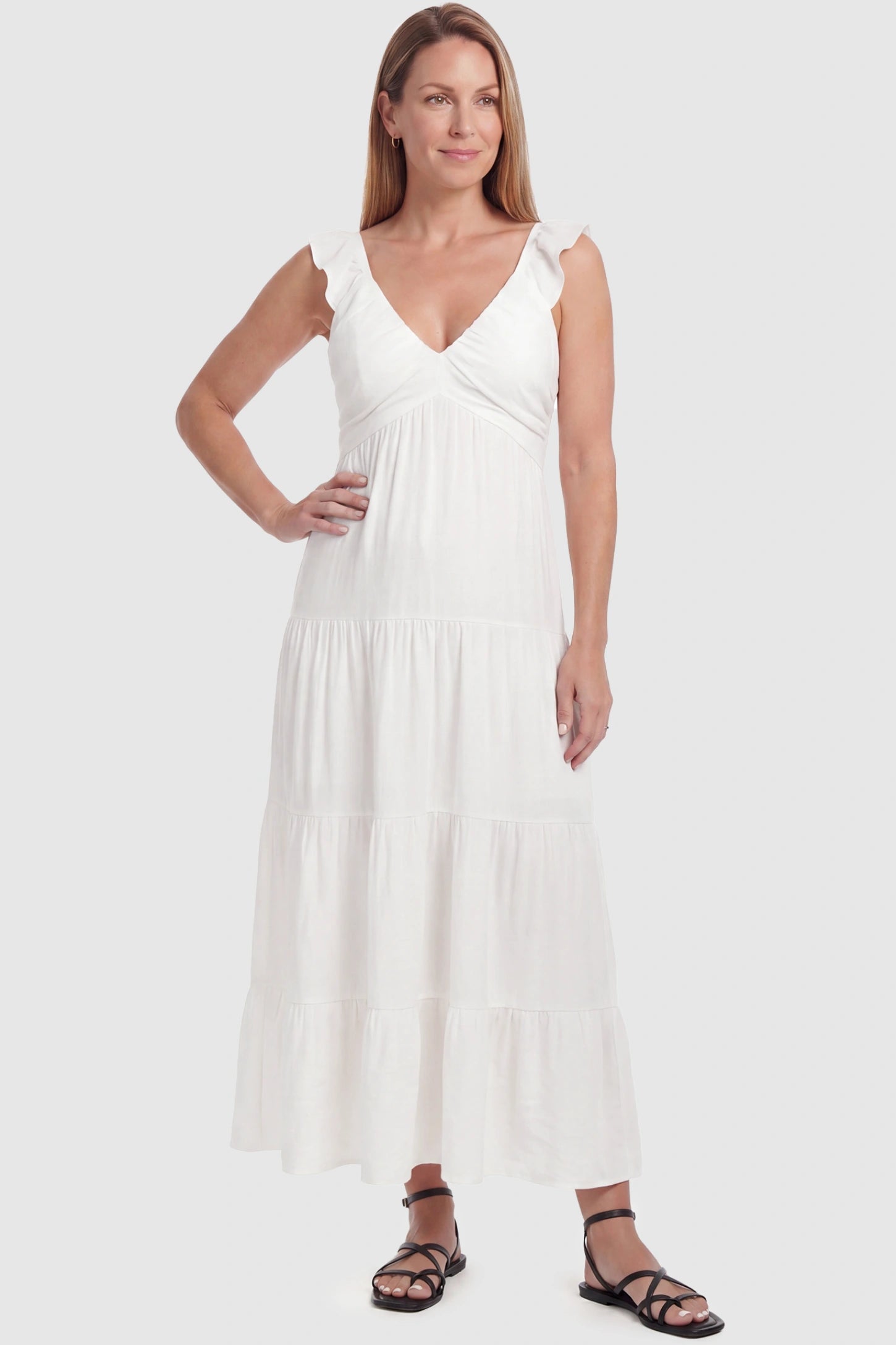 Ruffled Sleeve V-neck A-line Maternity Midi Dress Ruffled sleeve V-neck A-line maternity midi dress in off-white with V-neckline and ruffled sleeves, front view on postpartum model