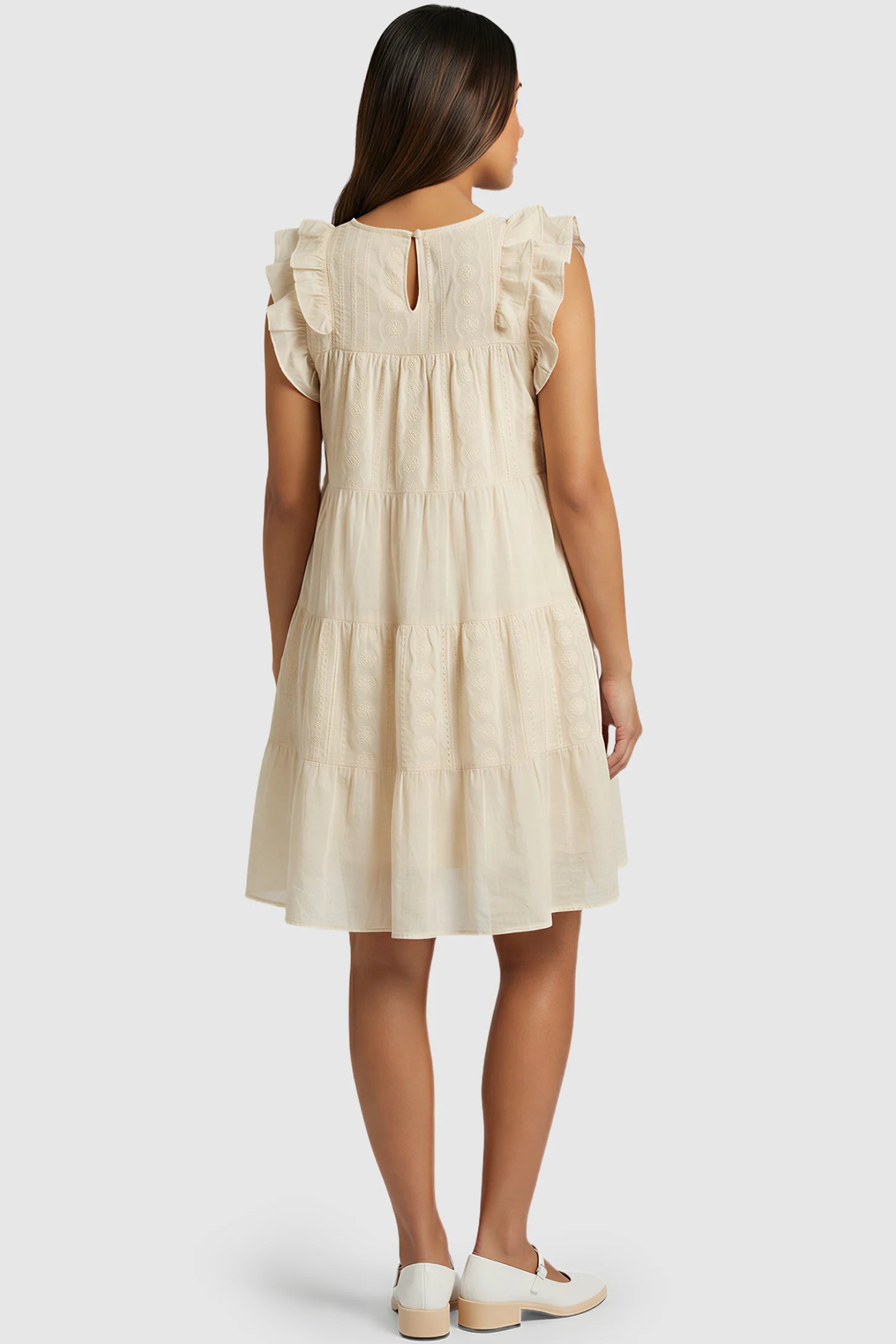 Crochet Detail Round Neck Tiered Maternity Short Dress Crochet detail round neck tiered maternity short dress in pale yellow with tiered & ruffle sleeve design, back view on pregnant model