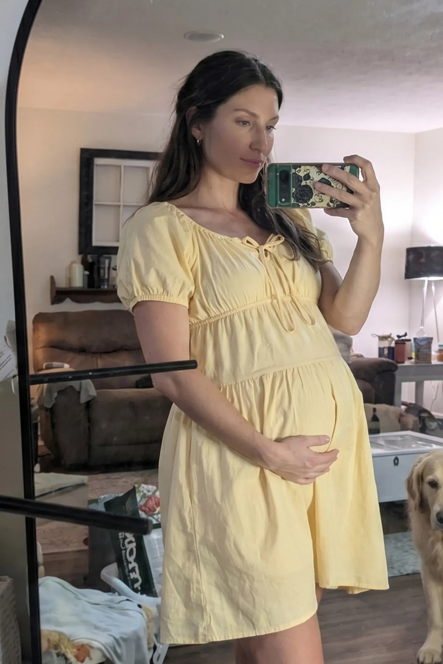 Short Sleeve Tiered A-Line Maternity Short Dress Short sleeve tiered A-line maternity short dress in yellow with flowy tiered silhouette, front view on pregnant model