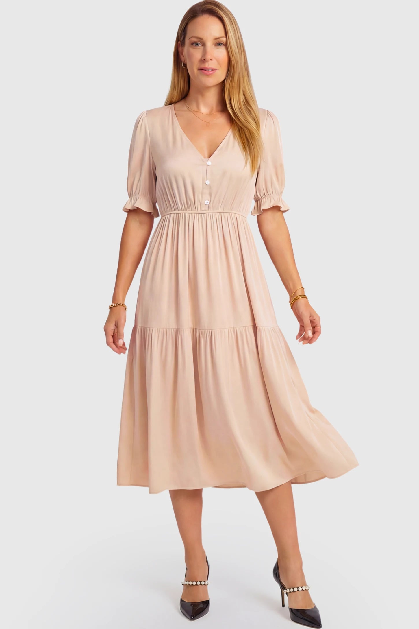 Tiered Hem A-Line Maternity Midi Dress Tiered Hem A-Line Maternity Midi Dress in apricot featuring empire waist, elbow-length puff sleeves, V-neckline, and flowy skirt on non pregnant model.