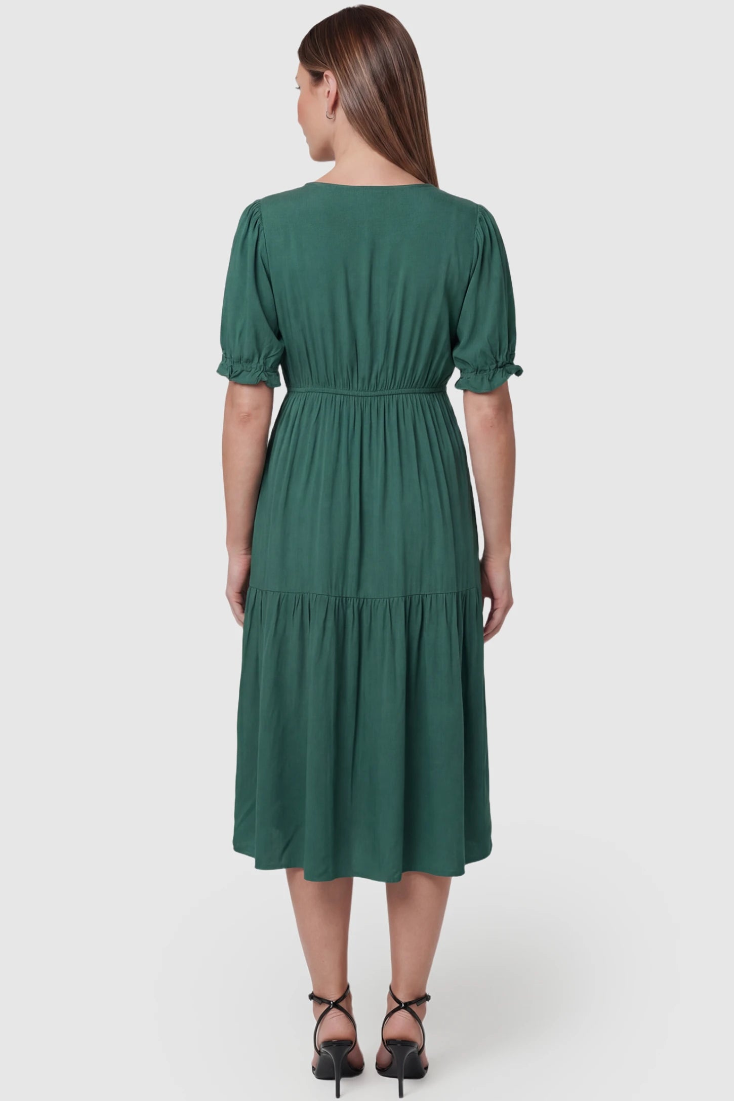 Tiered Hem A-Line Maternity Midi Dress Tiered Hem A-Line Maternity Midi Dress in army green featuring empire waist, elbow-length puff sleeves, V-neckline, and flowy skirt on pregnant model. back view