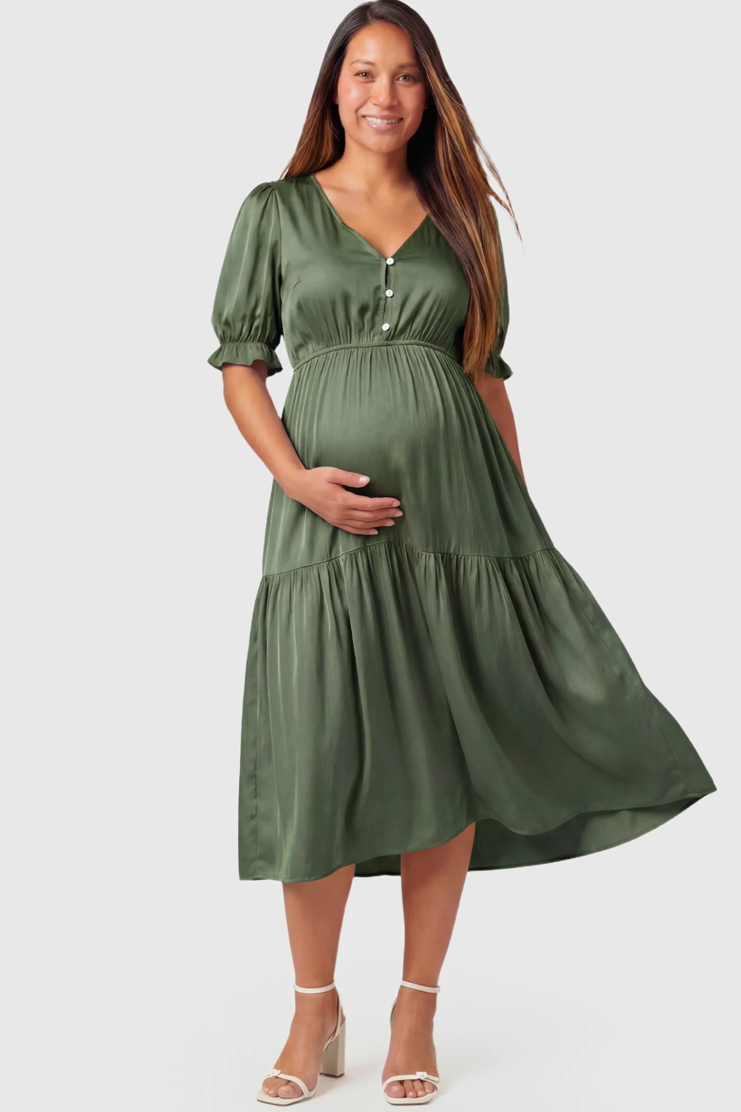 Tiered Hem A-Line Maternity Midi Dress in army green featuring empire waist, elbow-length puff sleeves, V-neckline, and flowy skirt on pregnant model.