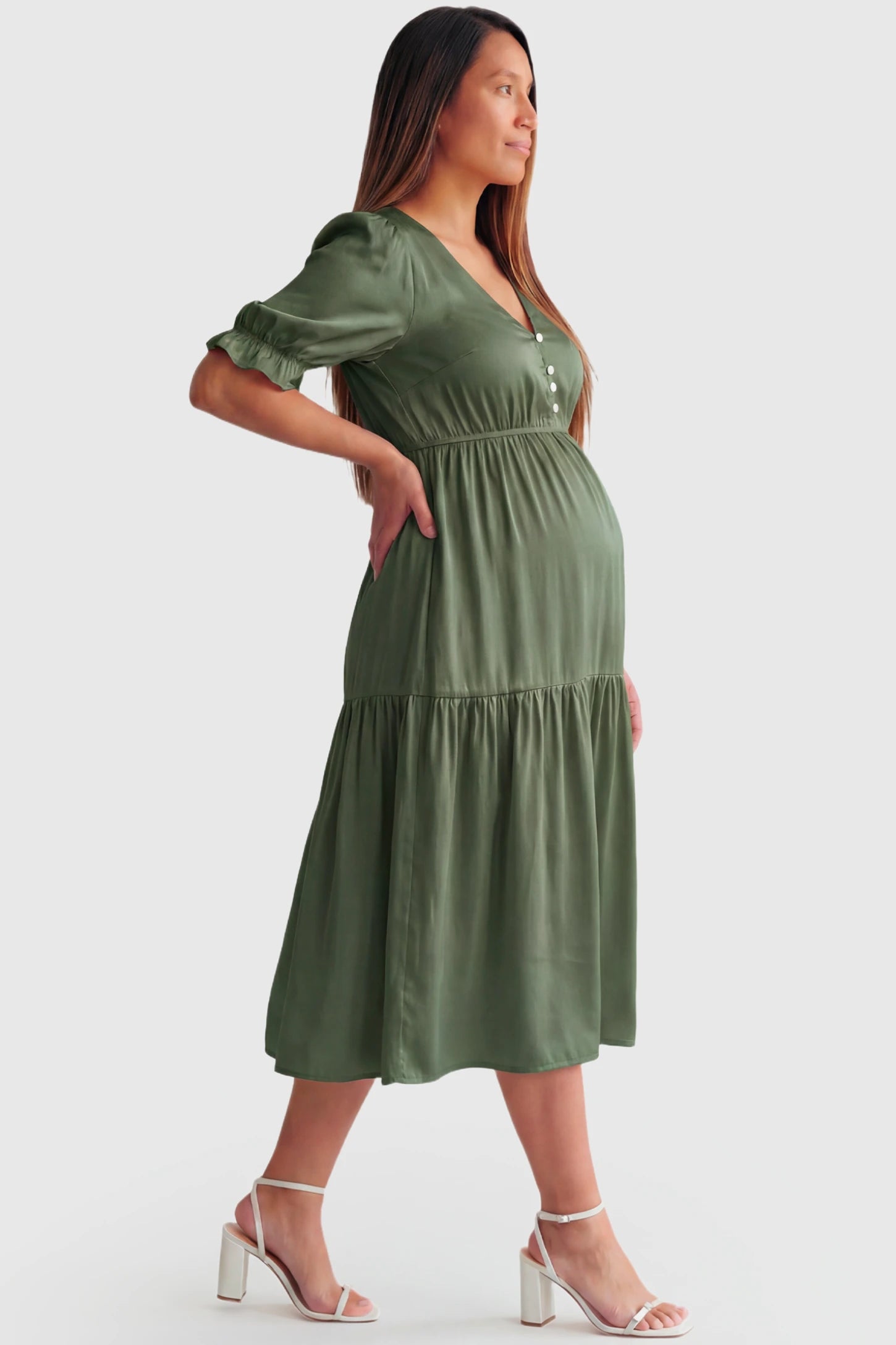 Tiered Hem A-Line Maternity Midi Dress in army green featuring empire waist, elbow-length puff sleeves, V-neckline, and flowy skirt on pregnant model.
