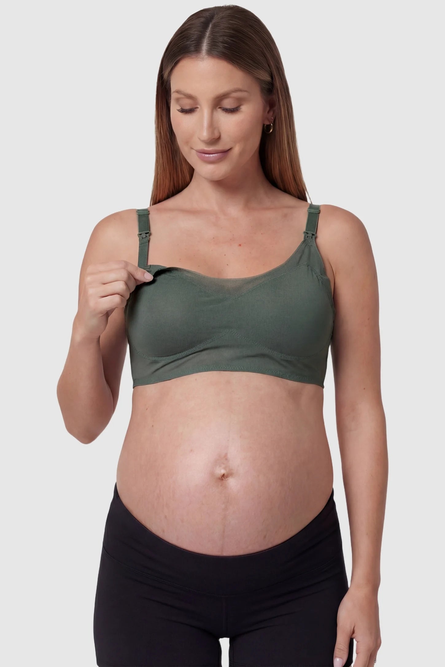 Top-Open One-Handed Nursing Ice Silk Seamless Nursing Bra Green Ice Silk Nursing Bra featuring a fold-down cup for one-handed nursing on a pregnant model, functional detail image.