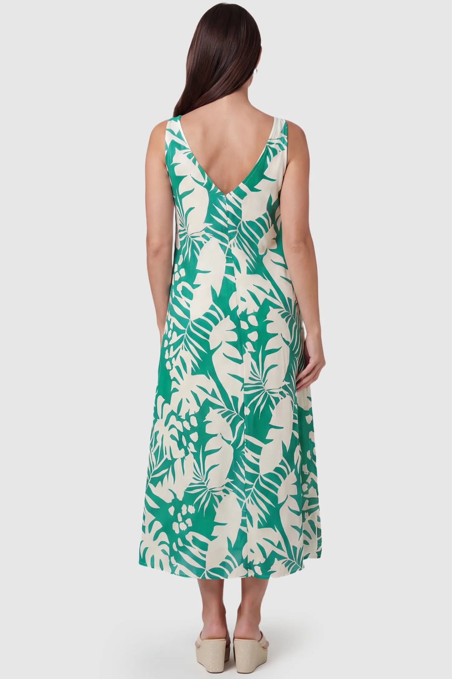 Tropical Print V-Back Sleeveless Midi Maternity Dress Back view of Green Tropical Print V-Back Sleeveless Midi Maternity Dress featuring a V-shaped back on a pregnant model.