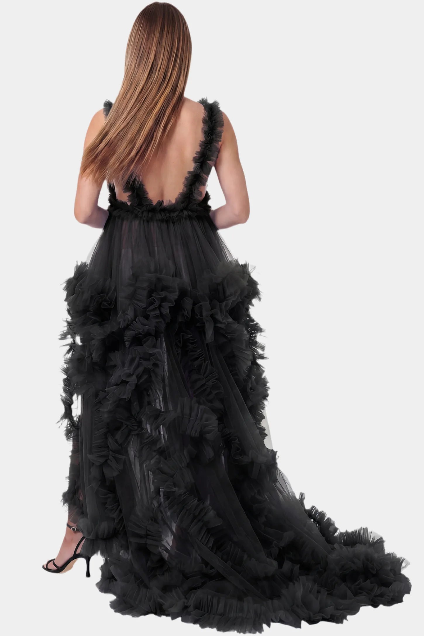 Multi-Layered Tulle Deep V-Neck Sleeveless Maxi Maternity Gown Multi-layered tulle deep V-neck sleeveless maxi maternity gown in black featuring an open back in full body front view on a pregnant model