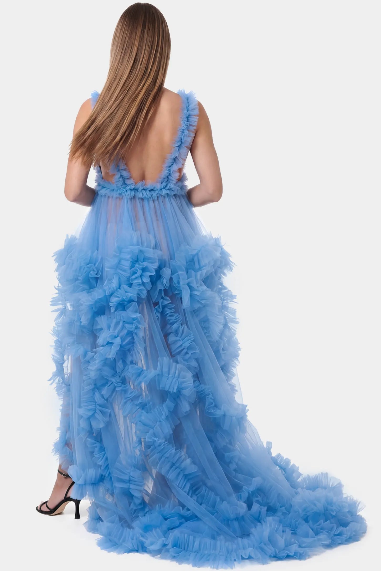 Multi-Layered Tulle Deep V-Neck Sleeveless Maxi Maternity Gown Multi-layered tulle deep V-neck sleeveless maxi maternity gown in blue featuring an open back in full body front view on a pregnant model