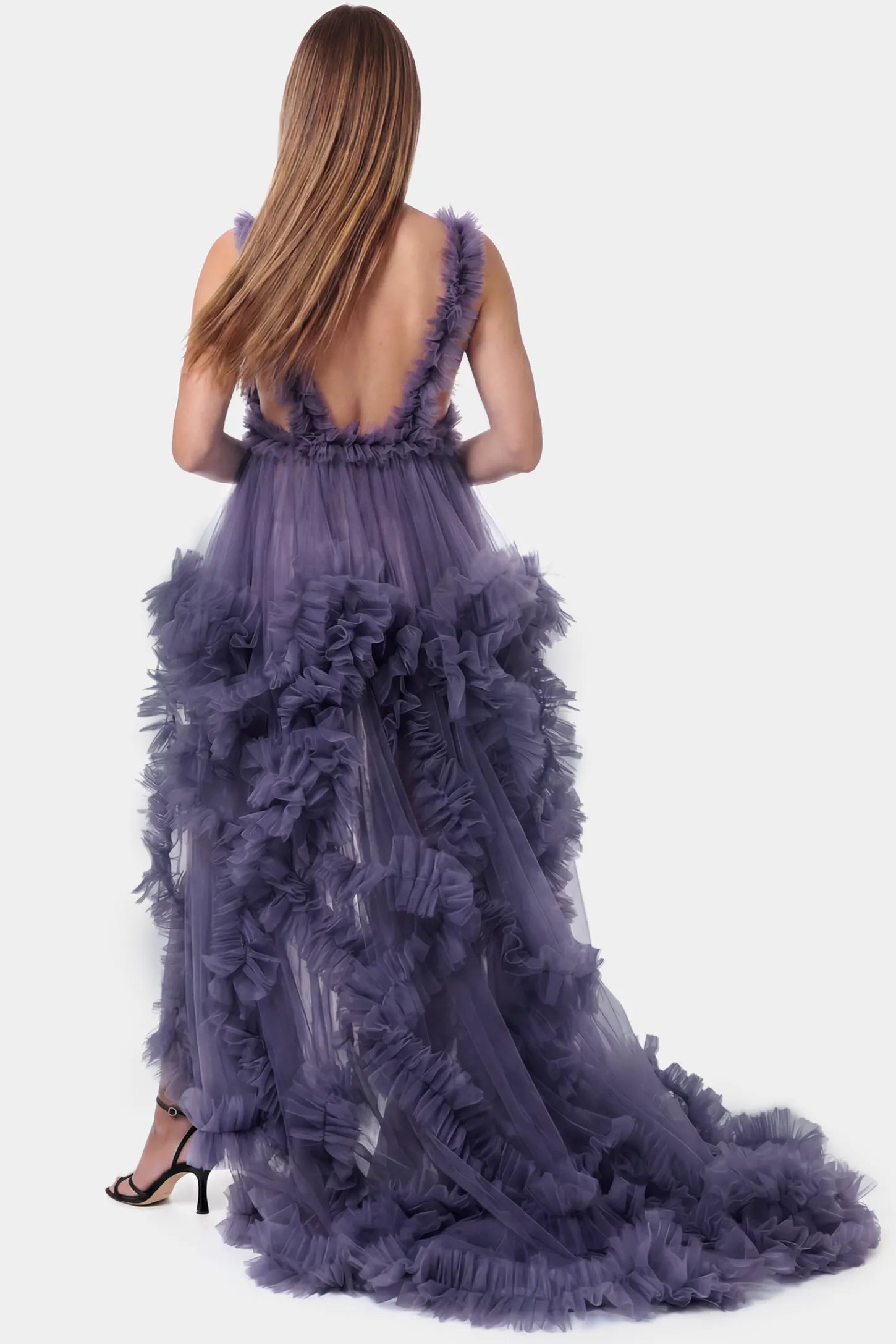 Multi-Layered Tulle Deep V-Neck Sleeveless Maxi Maternity Gown Multi-layered tulle deep V-neck sleeveless maxi maternity gown in dark purple featuring an open back in full body front view on a pregnant model