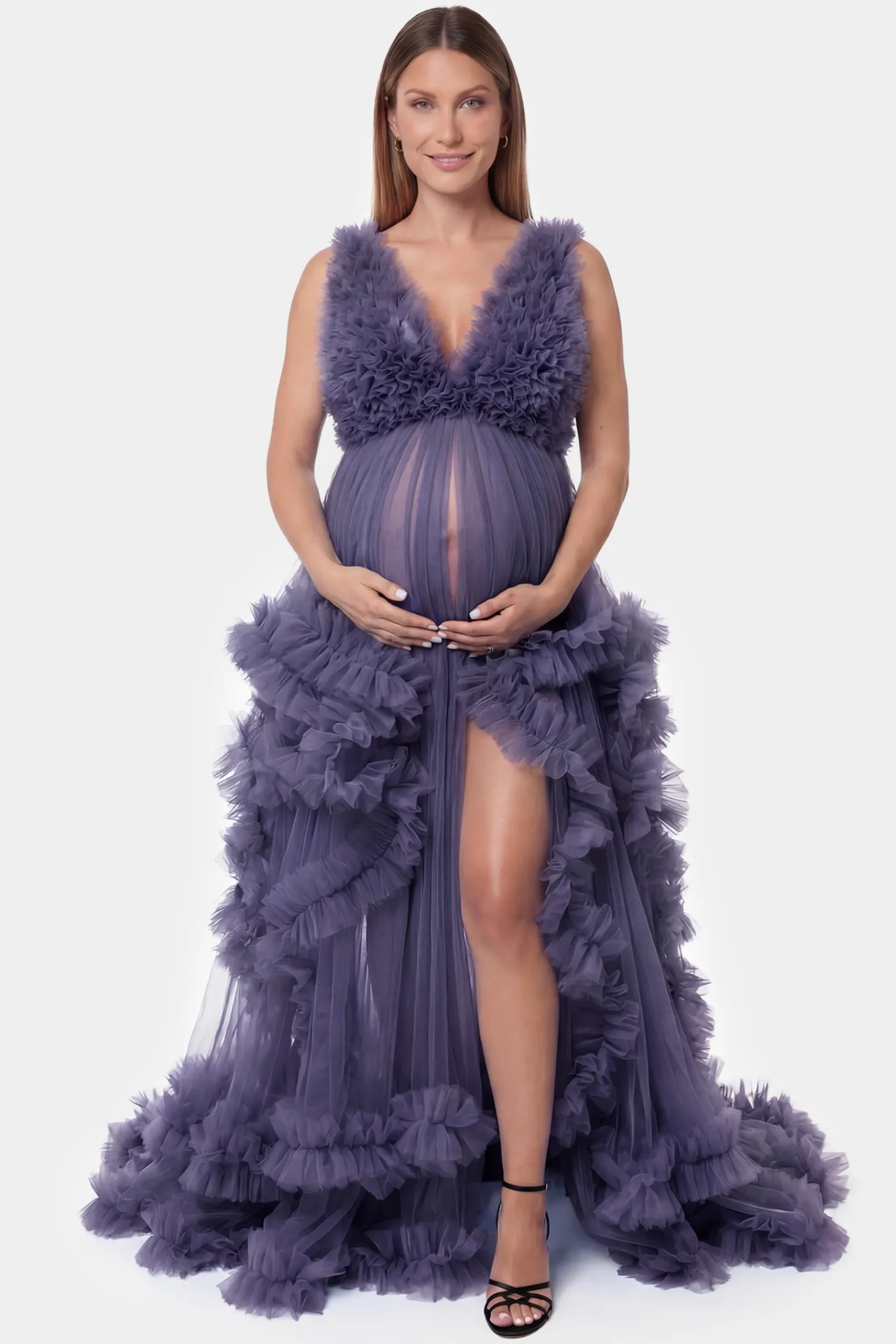Multi-Layered Tulle Deep V-Neck Sleeveless Maxi Maternity Gown Multi-layered tulle deep V-neck sleeveless maxi maternity gown in dark purple featuring flowing pleated silhouette in full body front view on a pregnant model