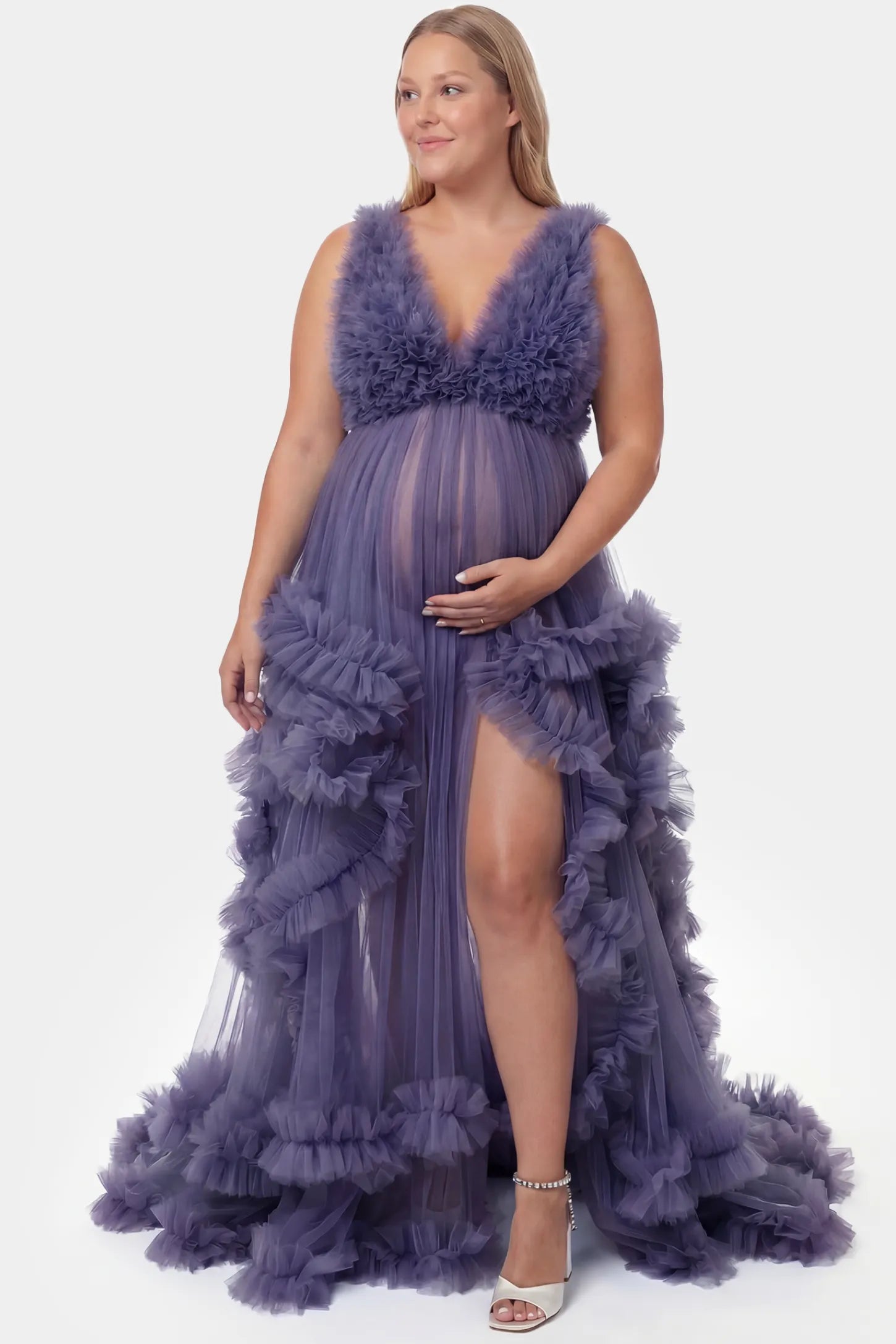 Multi-Layered Tulle Deep V-Neck Sleeveless Maxi Maternity Gown Multi-layered tulle deep V-neck sleeveless maxi maternity gown in dark purple featuring flowing pleated silhouette in full body front view on a plus-size model