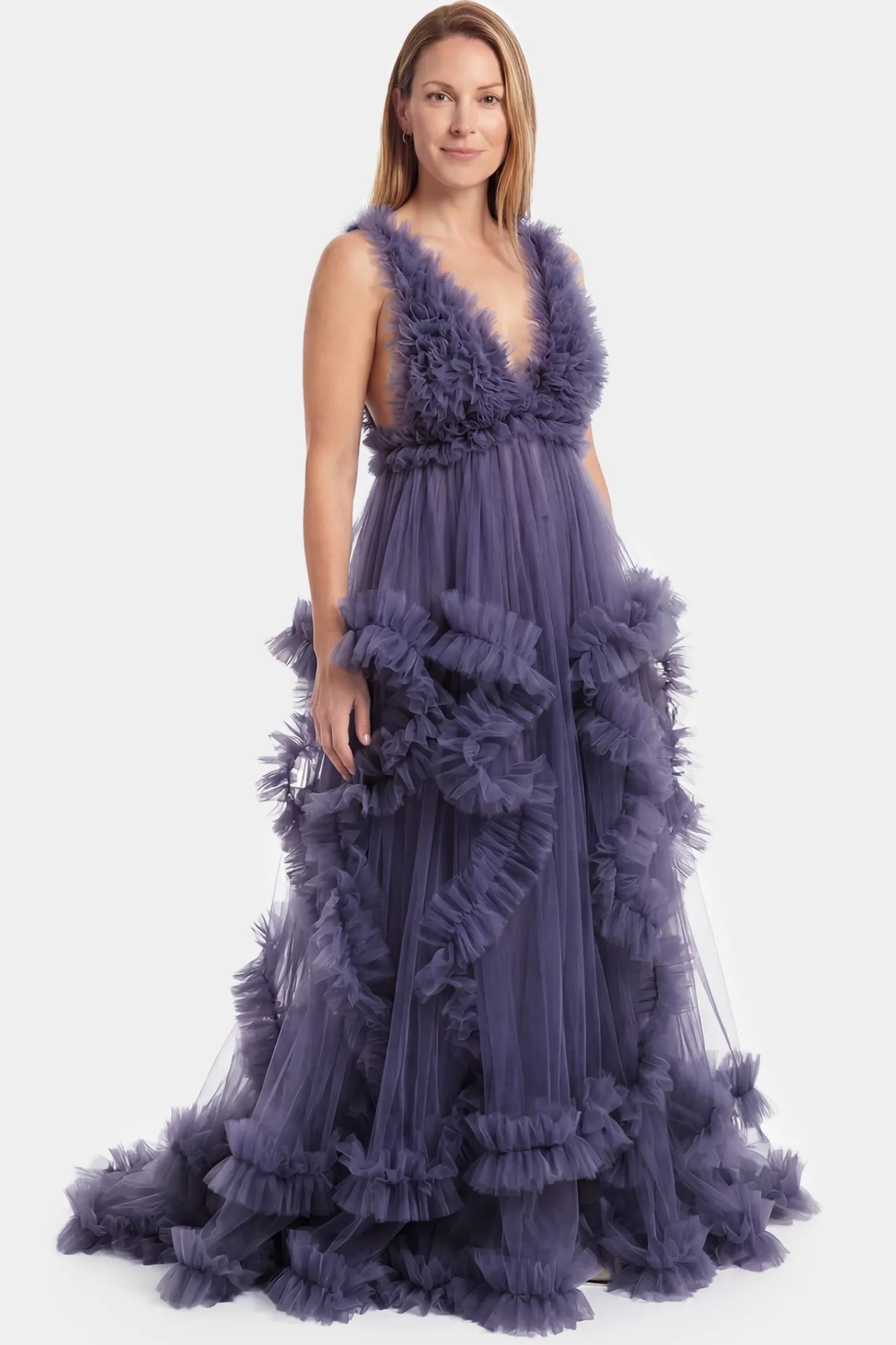 Multi-Layered Tulle Deep V-Neck Sleeveless Maxi Maternity Gown Multi-layered tulle deep V-neck sleeveless maxi maternity gown in dark purple featuring flowing pleated silhouette in full body front view on a postpartum model