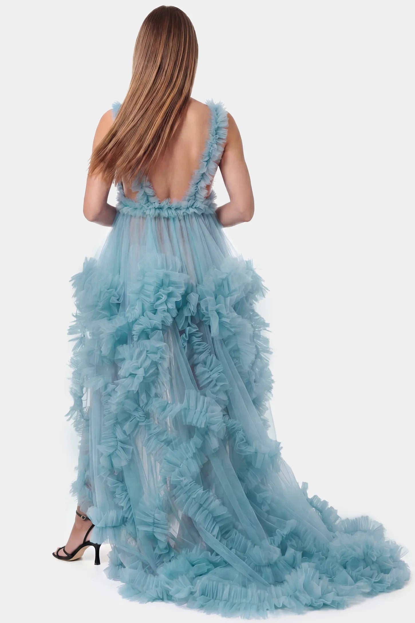 Multi-Layered Tulle Deep V-Neck Sleeveless Maxi Maternity Gown Multi-layered tulle deep V-neck sleeveless maxi maternity gown in lake blue featuring an open back in full body front view on a pregnant model