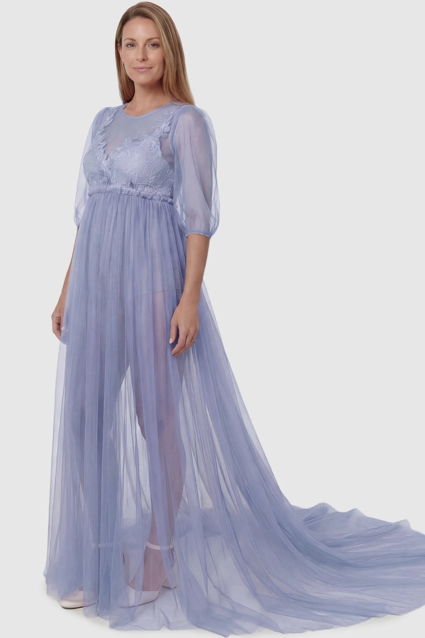 Tulle-Lace V-Neck Short Sleeve Trailing Maxi Maternity Dress Tulle-lace V-neck short sleeve trailing maxi maternity dress in light blue featuring romantic photography silhouette in full body view on a postpartum model