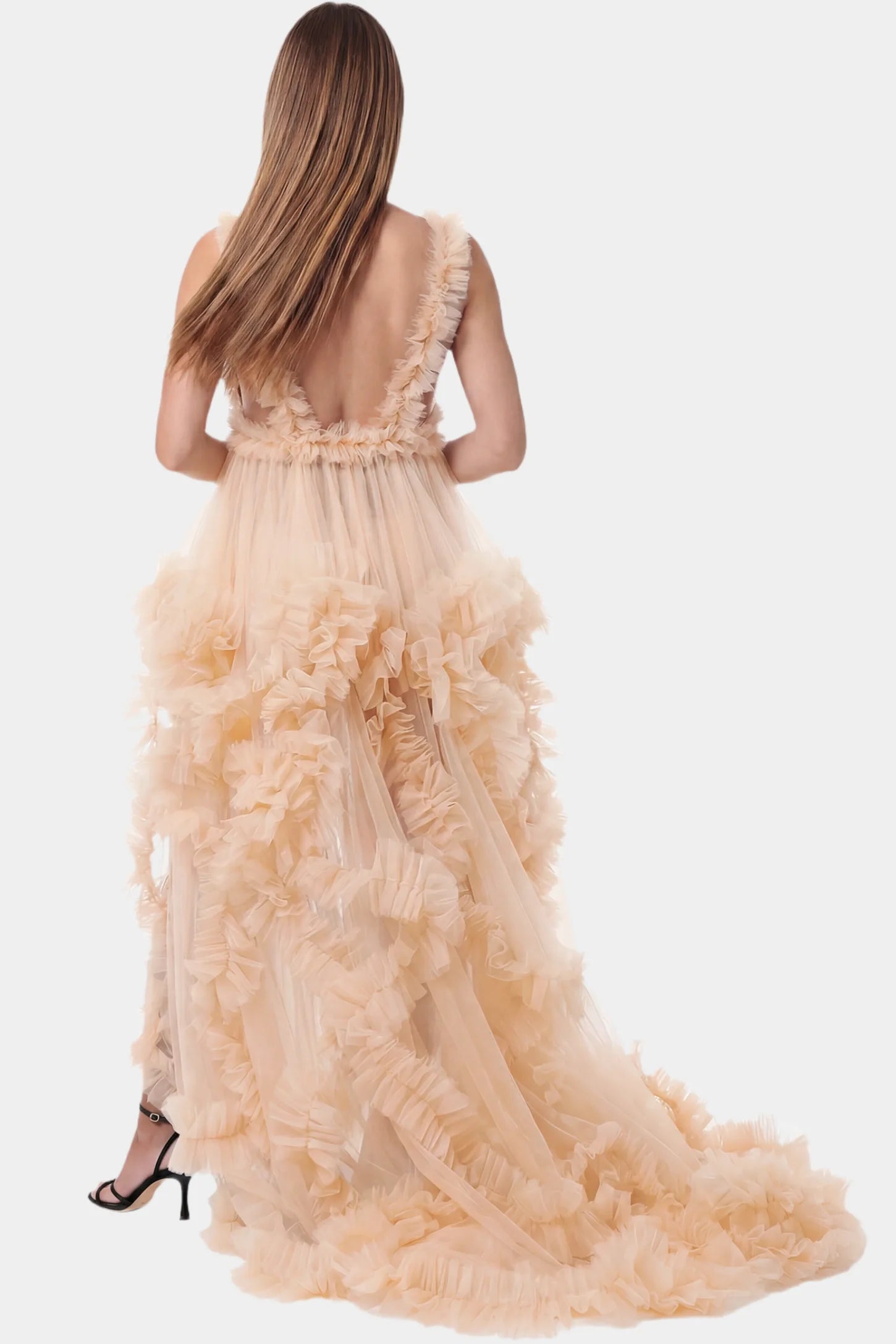 Multi-Layered Tulle Deep V-Neck Sleeveless Maxi Maternity Gown Multi-layered tulle deep V-neck sleeveless maxi maternity gown in nude featuring an open back in full body front view on a pregnant model