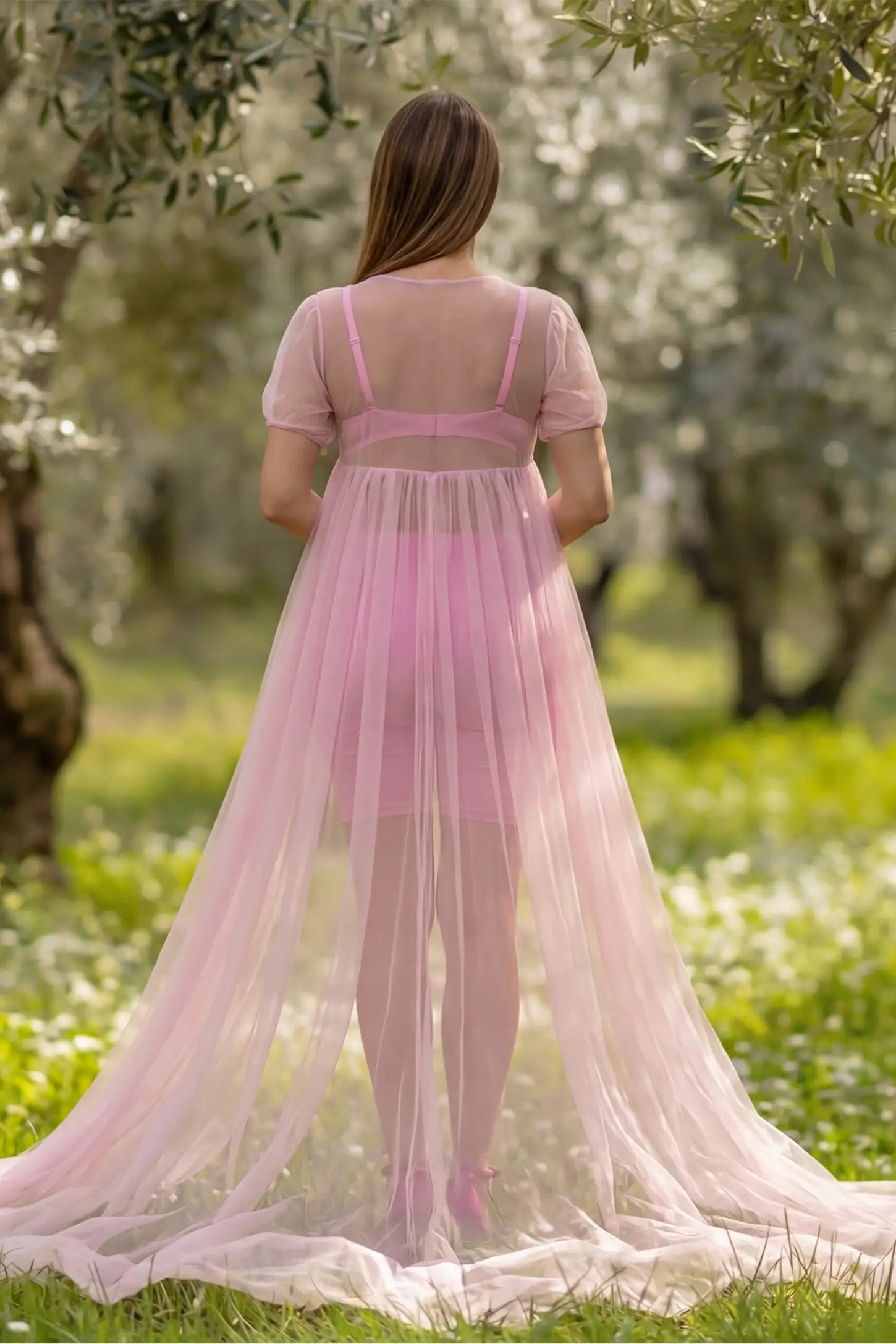 Tulle-Lace Sheer Half Sleeve Maternity Photoshoot Gown Tulle-lace sheer half sleeve maternity gown in pink with airy sheer sleeves, back view on pregnant model