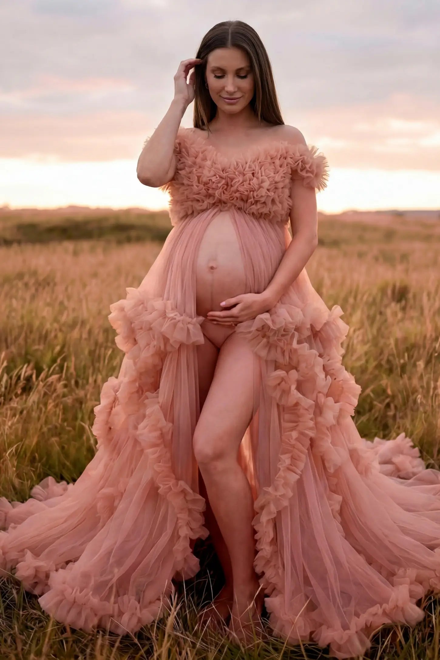 Ruffled Tulle Convertible Neckline Maternity Photoshoot Gown Ruffled tulle convertible neckline maternity photoshoot gown in pink with open front and ruffled tulle layers, front view on pregnant model