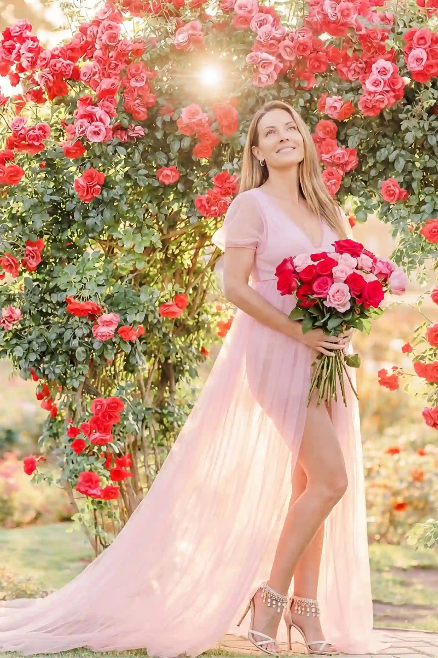 Tulle-Lace Sheer Half Sleeve Maternity Photoshoot Gown Tulle-lace sheer half sleeve maternity gown in pink with soft layered tulle flow, front view on postpartum model