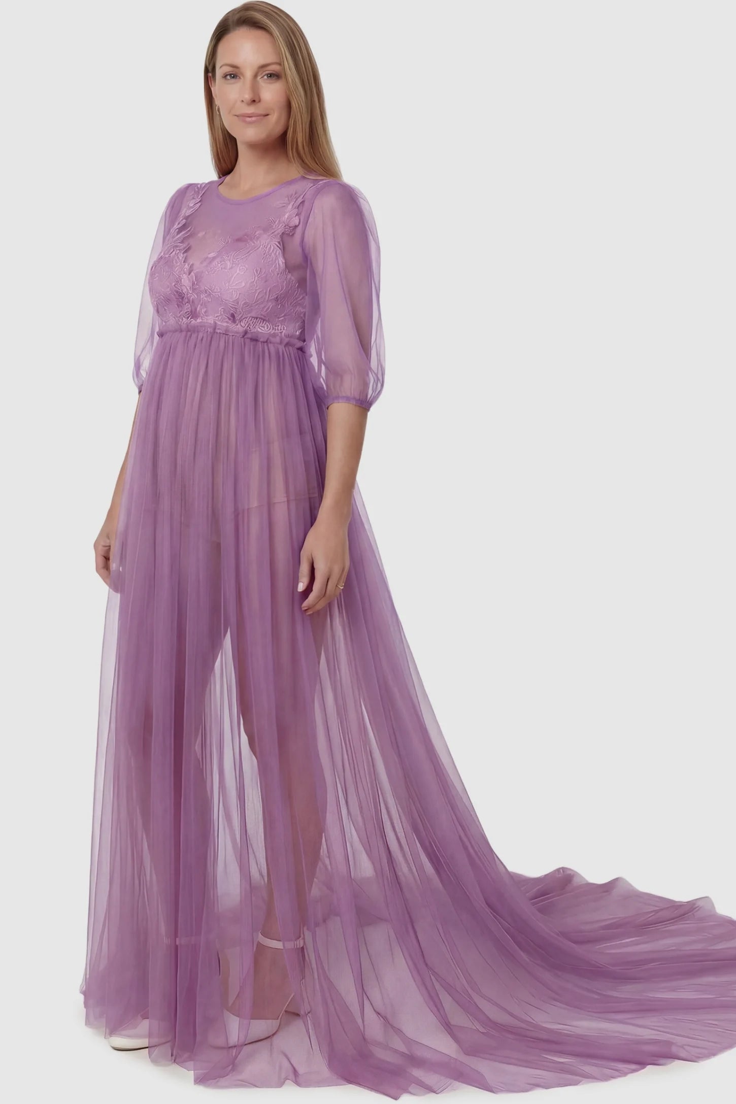 Tulle-Lace V-Neck Short Sleeve Trailing Maxi Maternity Dress Tulle-lace V-neck short sleeve trailing maxi maternity dress in violet featuring romantic photography silhouette in full body view on a postpartum model