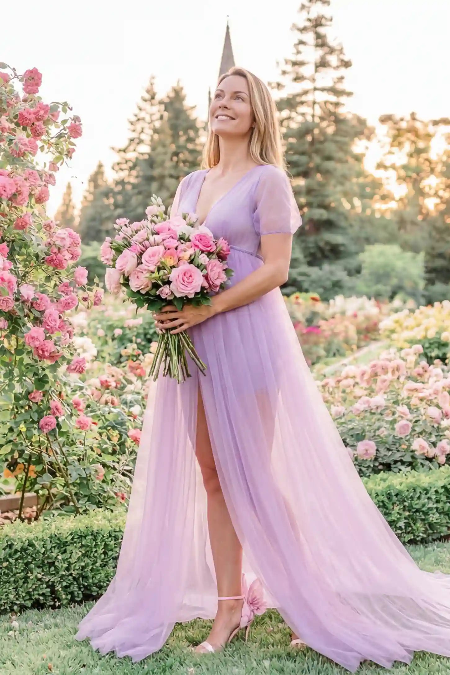 Tulle-Lace Sheer Half Sleeve Maternity Photoshoot Gown Tulle-lace sheer half sleeve maternity gown in violet with soft layered tulle flow, front view on postpartum model
