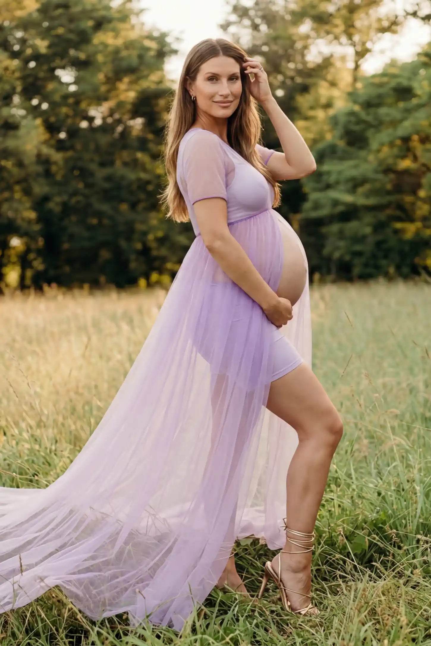 Tulle-Lace Sheer Half Sleeve Maternity Photoshoot Gown Tulle-lace sheer half sleeve maternity gown in violet with delicate lace-spliced detail and high front slit, side view on pregnant model