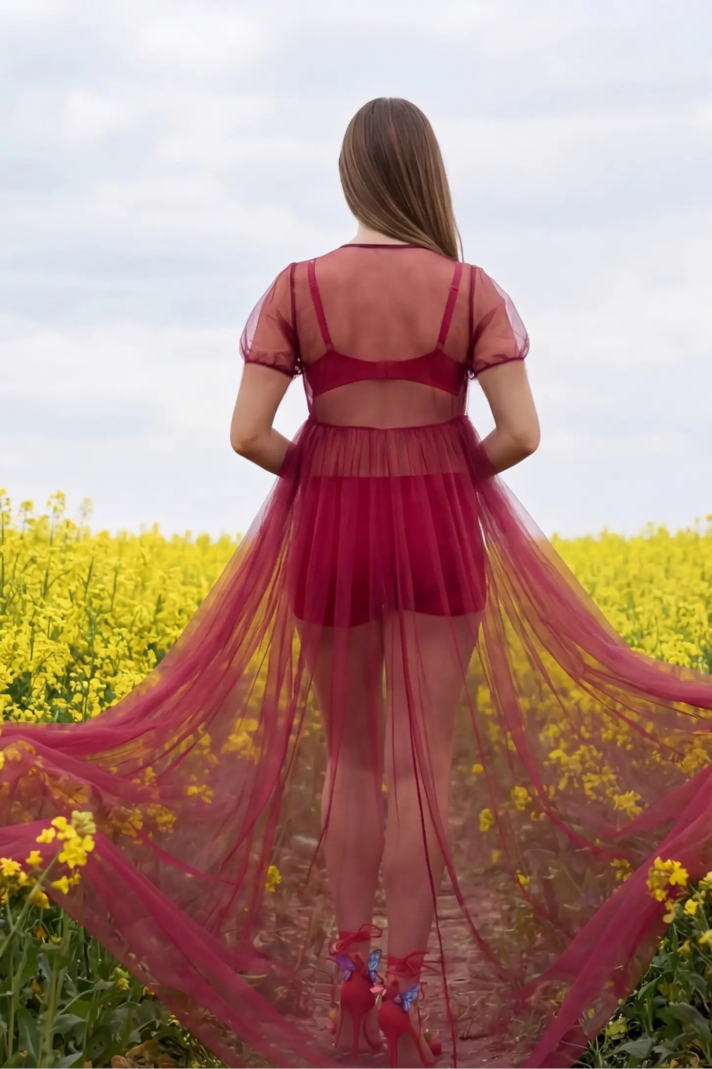 Tulle-Lace Sheer Half Sleeve Maternity Photoshoot Gown Tulle-lace sheer half sleeve maternity gown in wine red with airy sheer sleeves, back view on pregnant model
