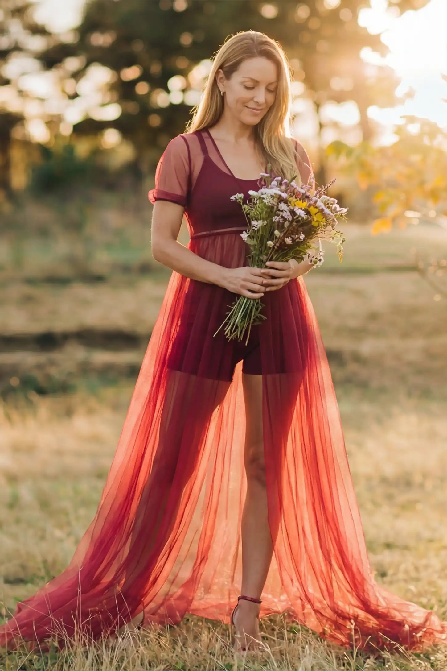 Tulle-Lace Sheer Half Sleeve Maternity Photoshoot Gown Tulle-lace sheer half sleeve maternity gown in wine red with soft layered tulle flow, front view on postpartum model