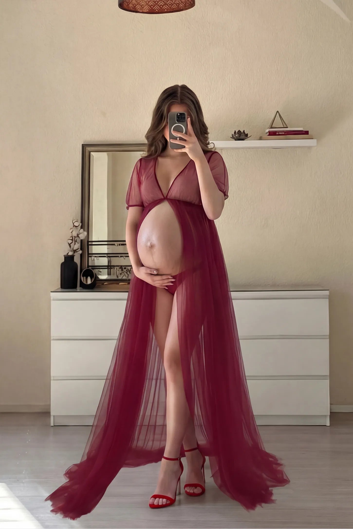 Tulle-Lace Sheer Half Sleeve Maternity Photoshoot Gown Tulle-lace sheer half sleeve maternity gown in wine red with delicate lace-spliced detail and high front slit, front view on pregnant model