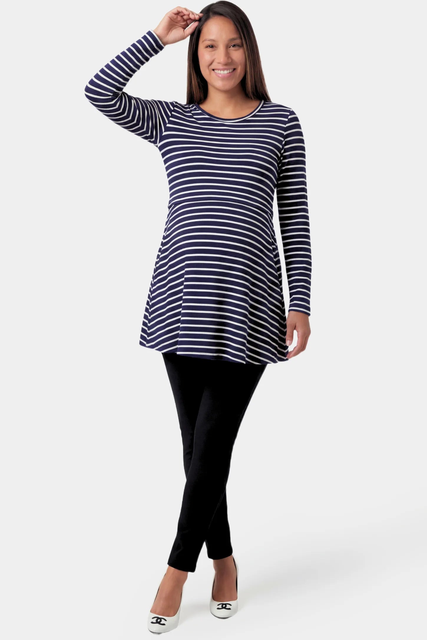 Striped Long Sleeve Maternity & Nursing Tunic Top Striped Long Sleeve Maternity & Nursing Tunic Top in blue and white stripes featuring a crew neck and flowy A-line silhouette on a pregnant model.
