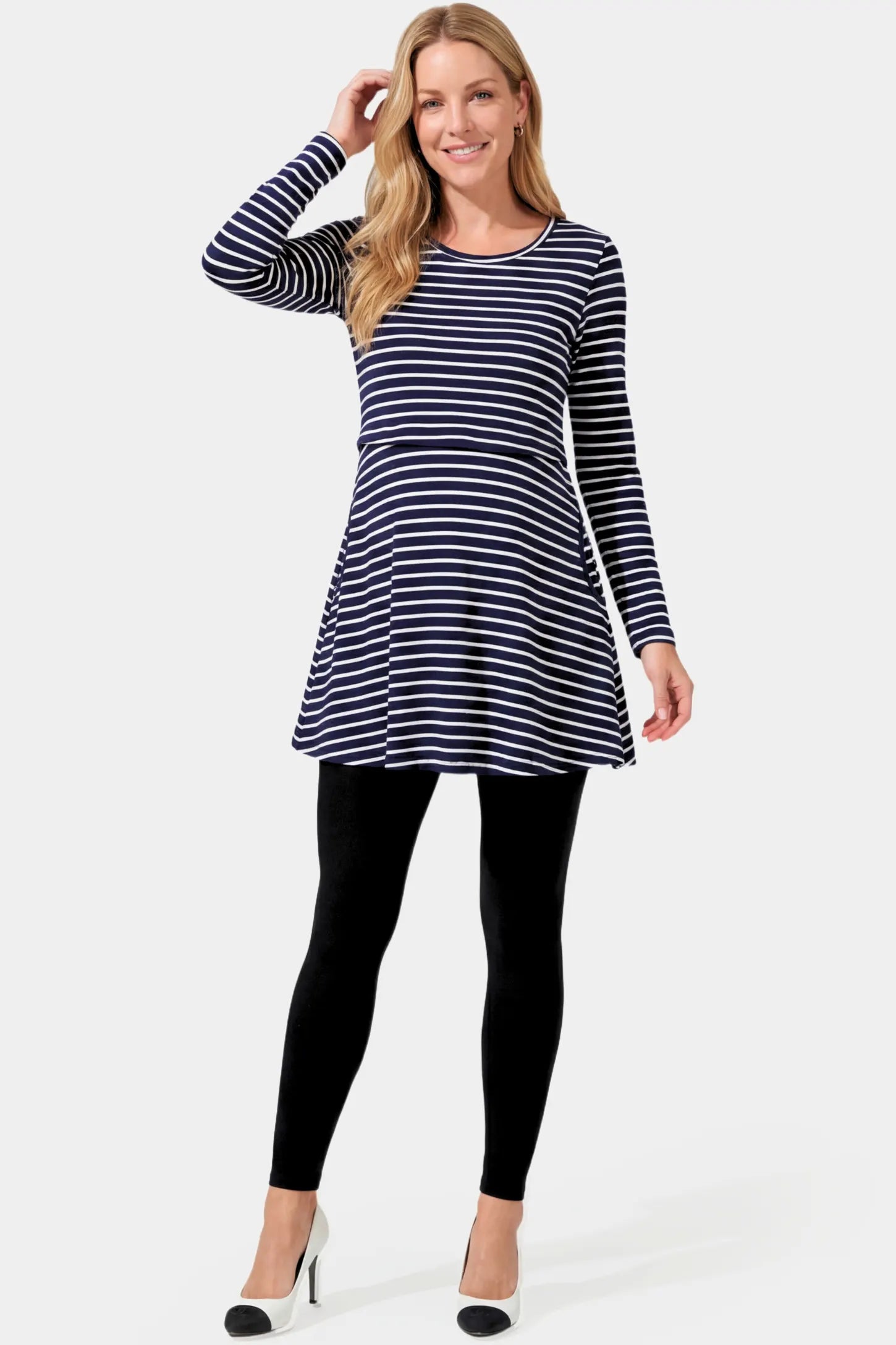 Striped Long Sleeve Maternity & Nursing Tunic Top Striped Long Sleeve Maternity & Nursing Tunic Top in blue and white stripes featuring a crew neck and flowy A-line silhouette on a non pregnant model.